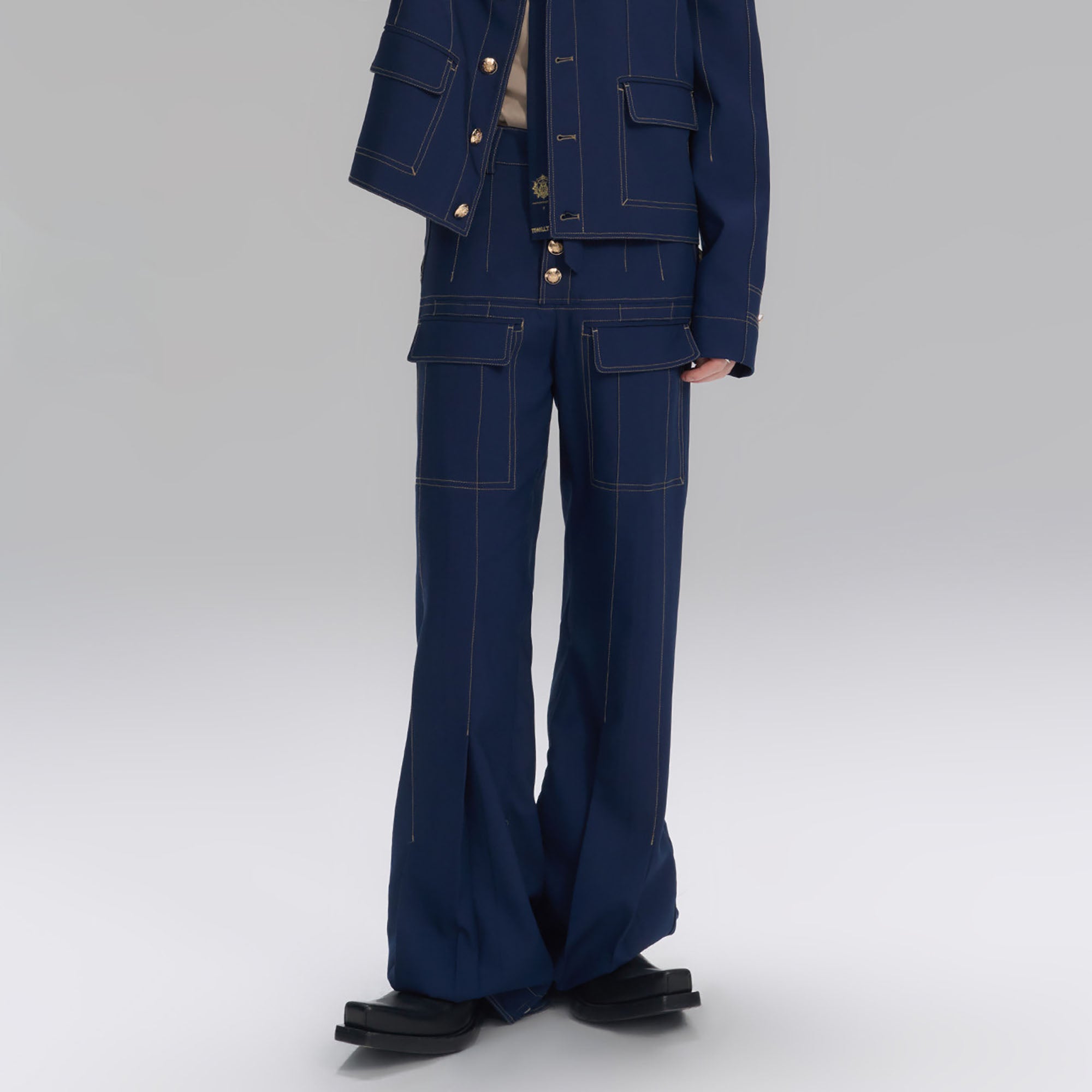 TIWILLTANG Stitched Button-Up Pleated Flared Pants