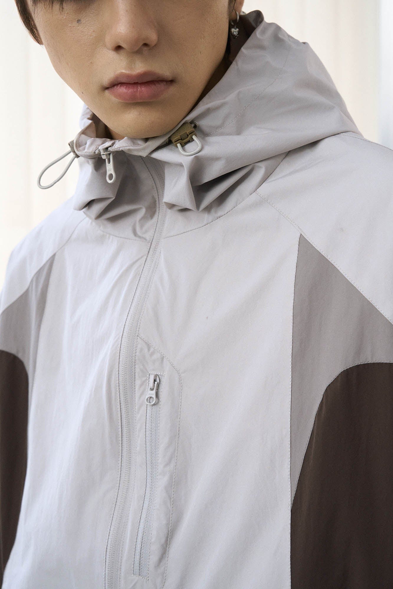 ENSHADOWER Spliced Contrasted Drawstring Windbreaker