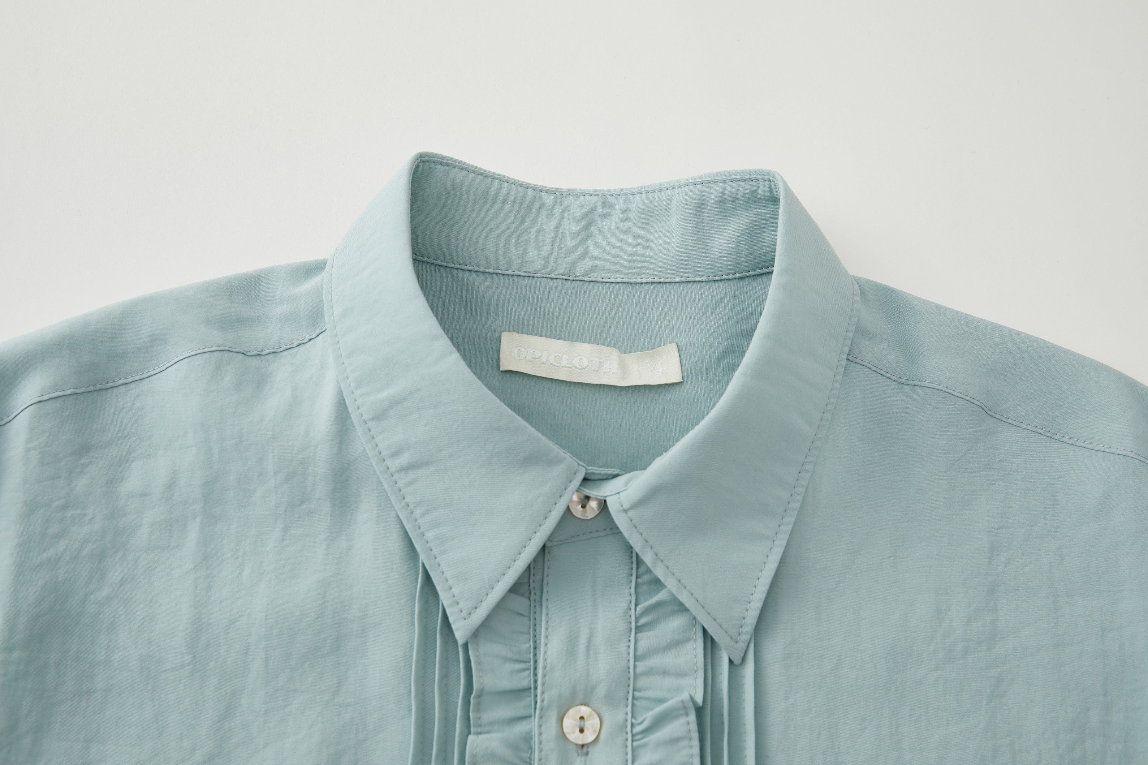 OPICLOTH Retro Pintuck Ruffle Modal Blend Half Shirt