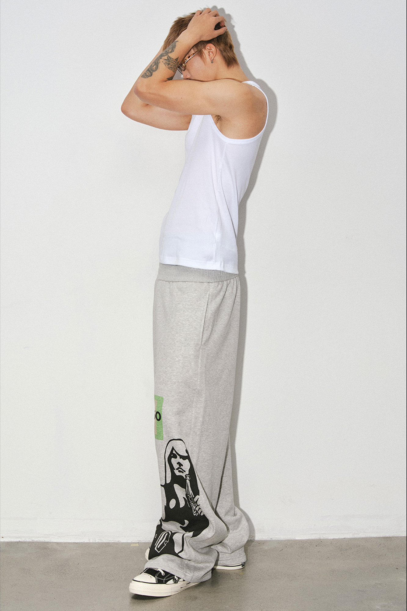 NOVACAM Portrait Graphic Curved Wide-Leg Sweatpants