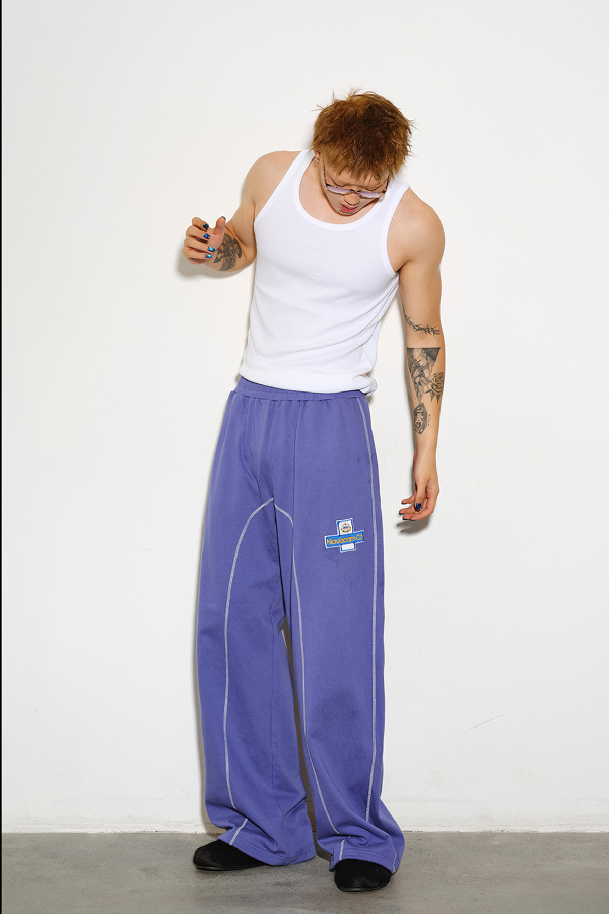 NOVACAM Retro Athletic Embroidered Curved Sweatpants
