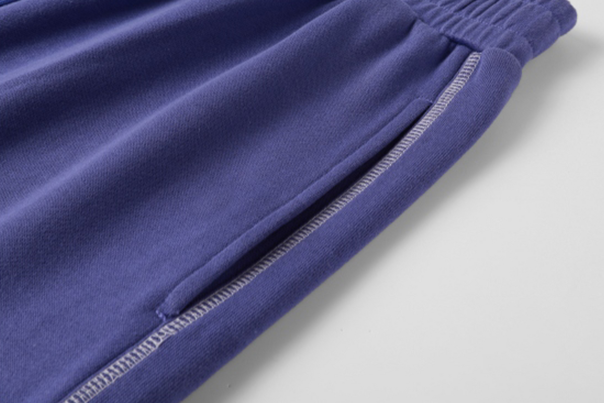NOVACAM Retro Athletic Embroidered Curved Sweatpants