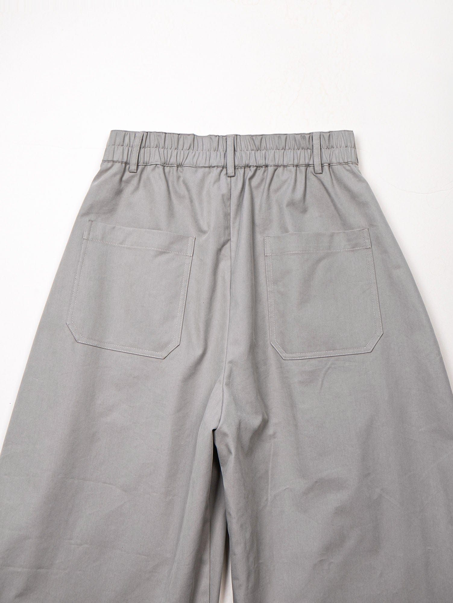 LEONSENSE Pleated Tencel Oversized Curved Pants, premium urban and streetwear designers apparel on PROJECTISR.com, LEONSENSE