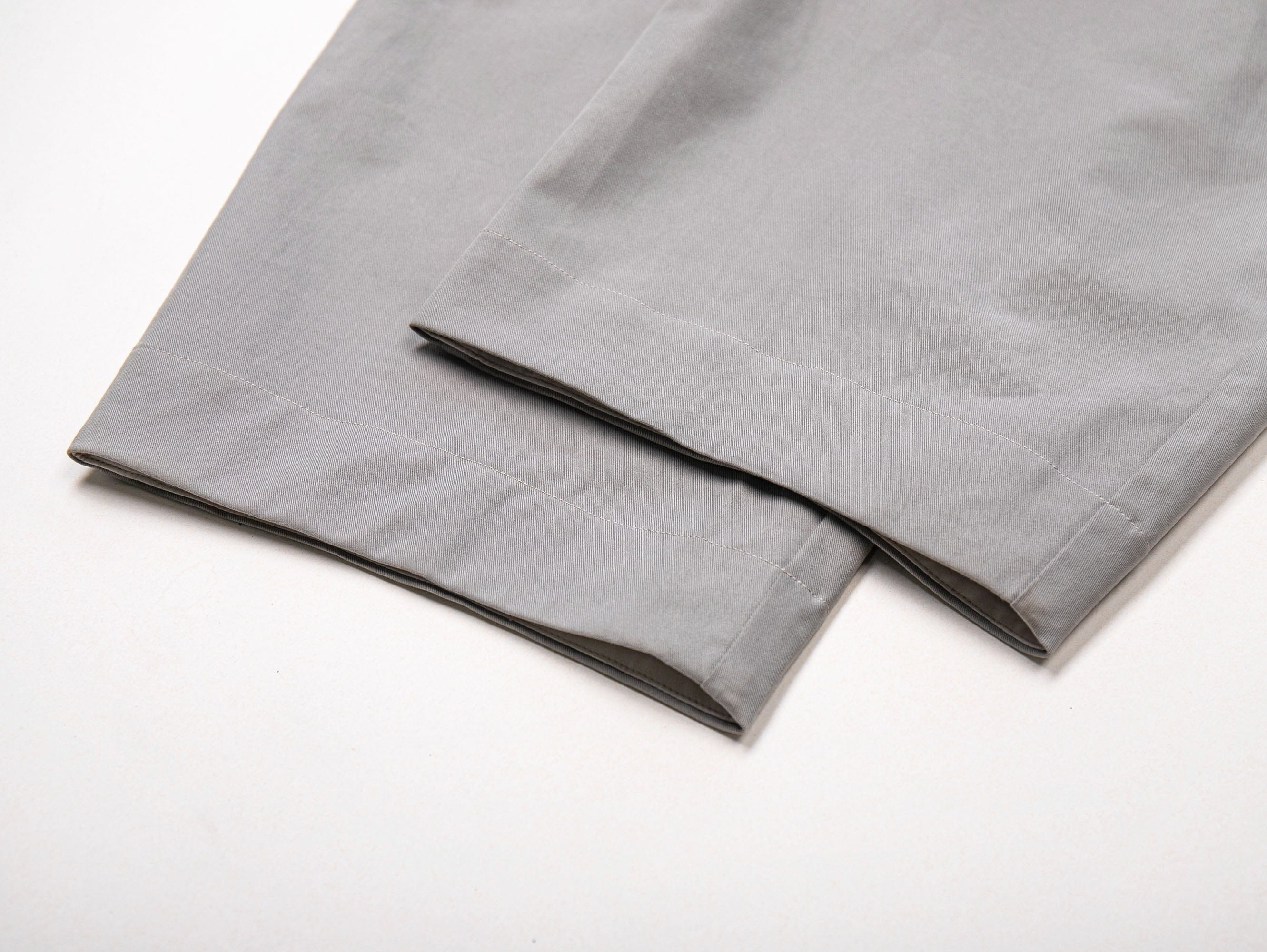 LEONSENSE Pleated Tencel Oversized Curved Pants, premium urban and streetwear designers apparel on PROJECTISR.com, LEONSENSE