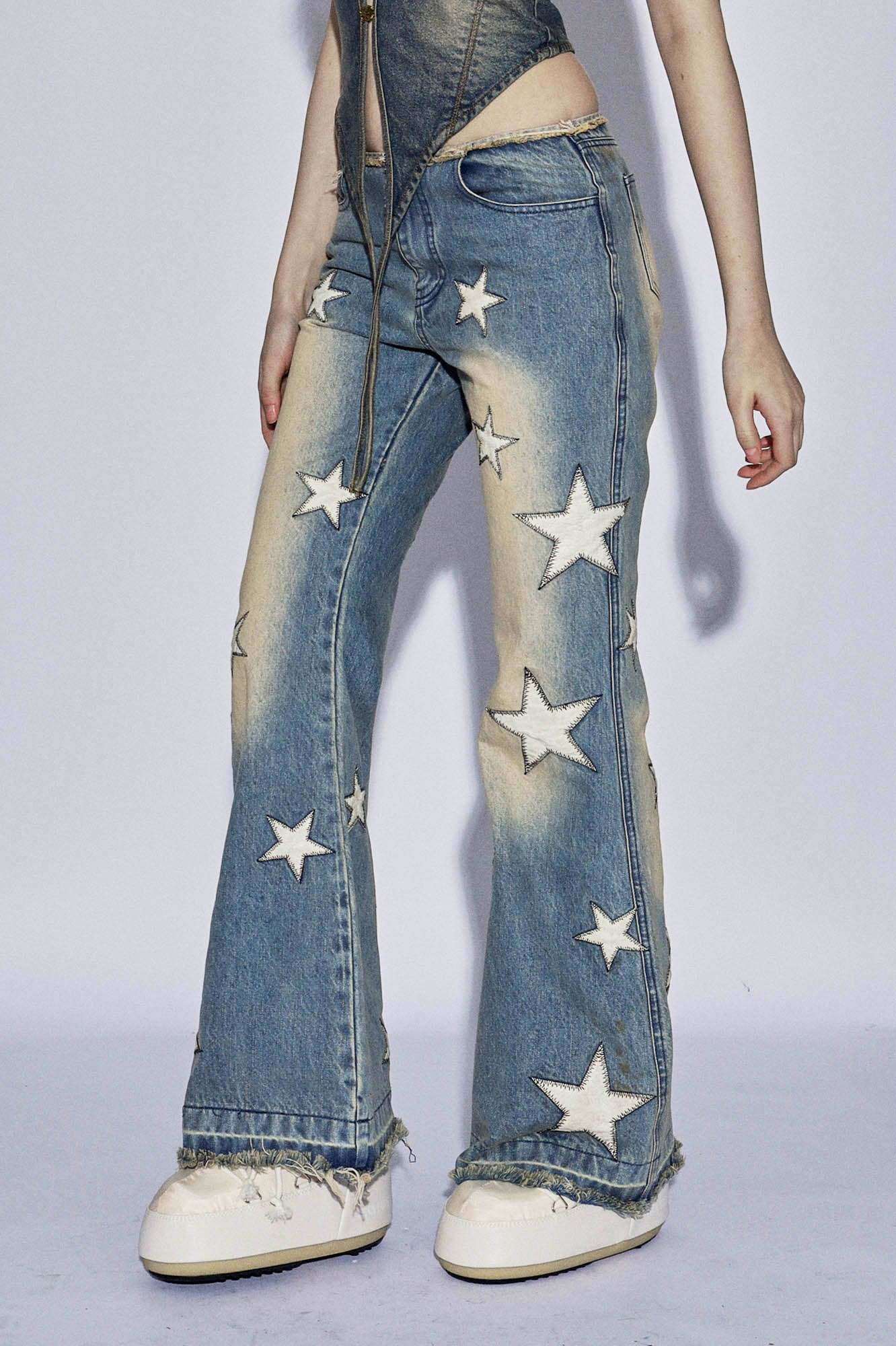 DND4DESxFaychui Starry Bleached Low-Rise Flared Jeans