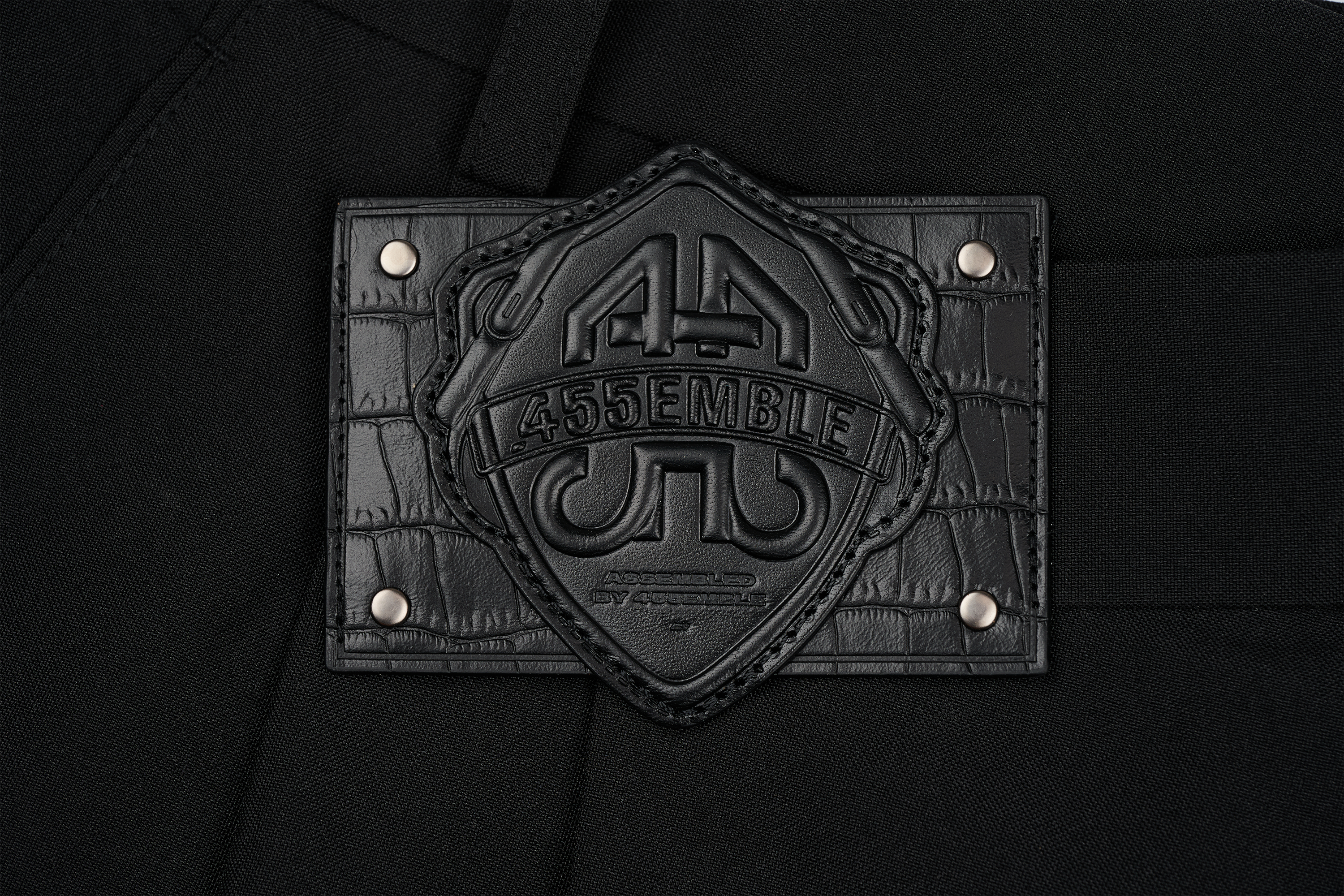 455EMBLE Asymmetric Waist Patch Wide-Leg Trousers