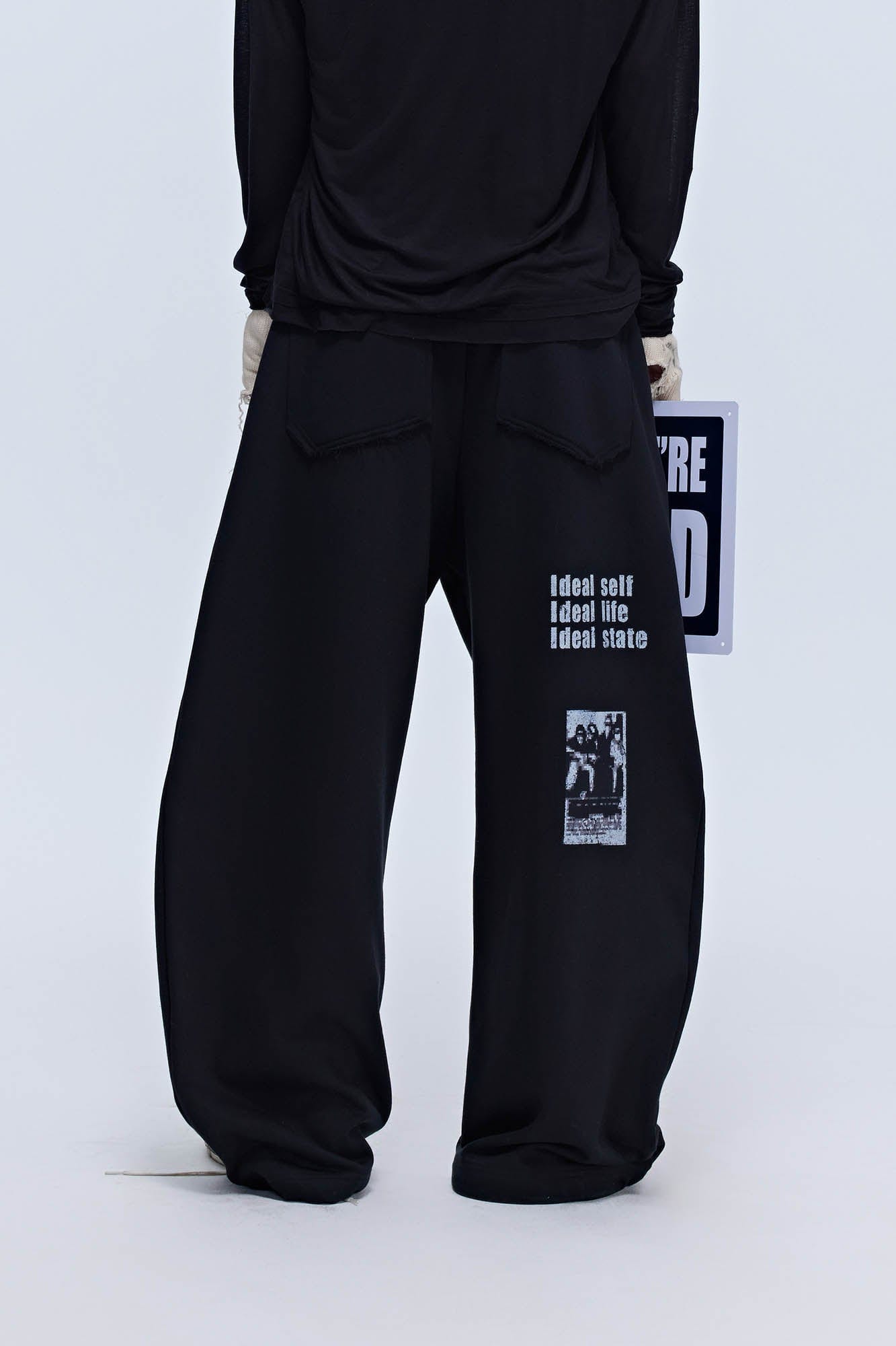 SAVAGEGROWTHWORLD Slogan Curved Drawstring Sweatpants, premium urban and streetwear designers apparel on PROJECTISR.com, SAVAGEGROWTHWORLD