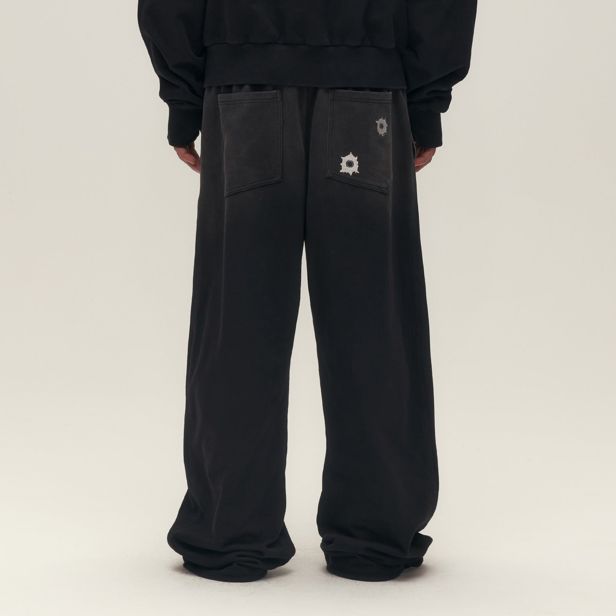 SAVAGEGROWTHWORLD Bullet Graphic Washed Wide-Leg Sweatpants, premium urban and streetwear designers apparel on PROJECTISR.com, SAVAGEGROWTHWORLD