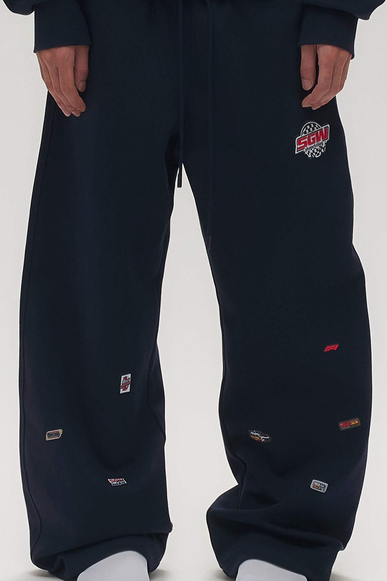 SAVAGEGROWTHWORLD Whimsical Stickers Drawstring Sweatpants