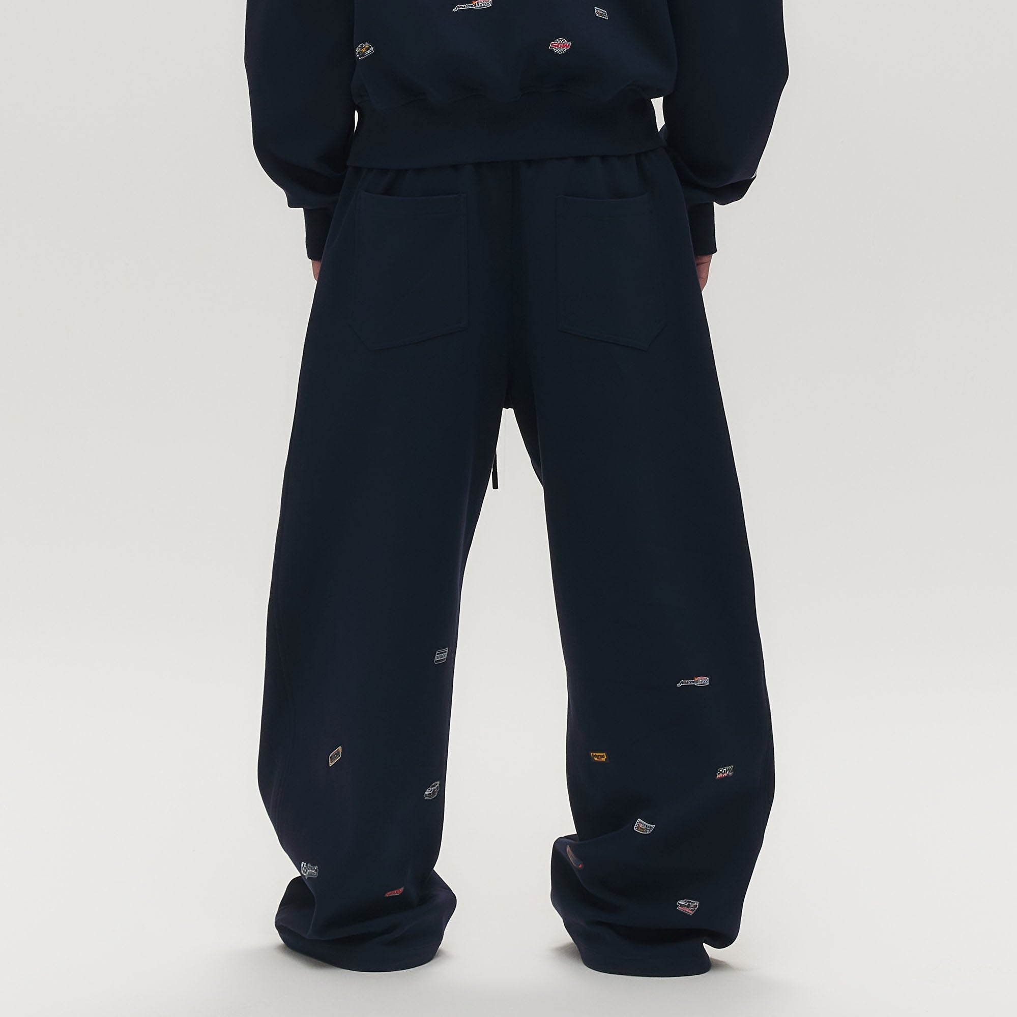 SAVAGEGROWTHWORLD Whimsical Stickers Drawstring Sweatpants