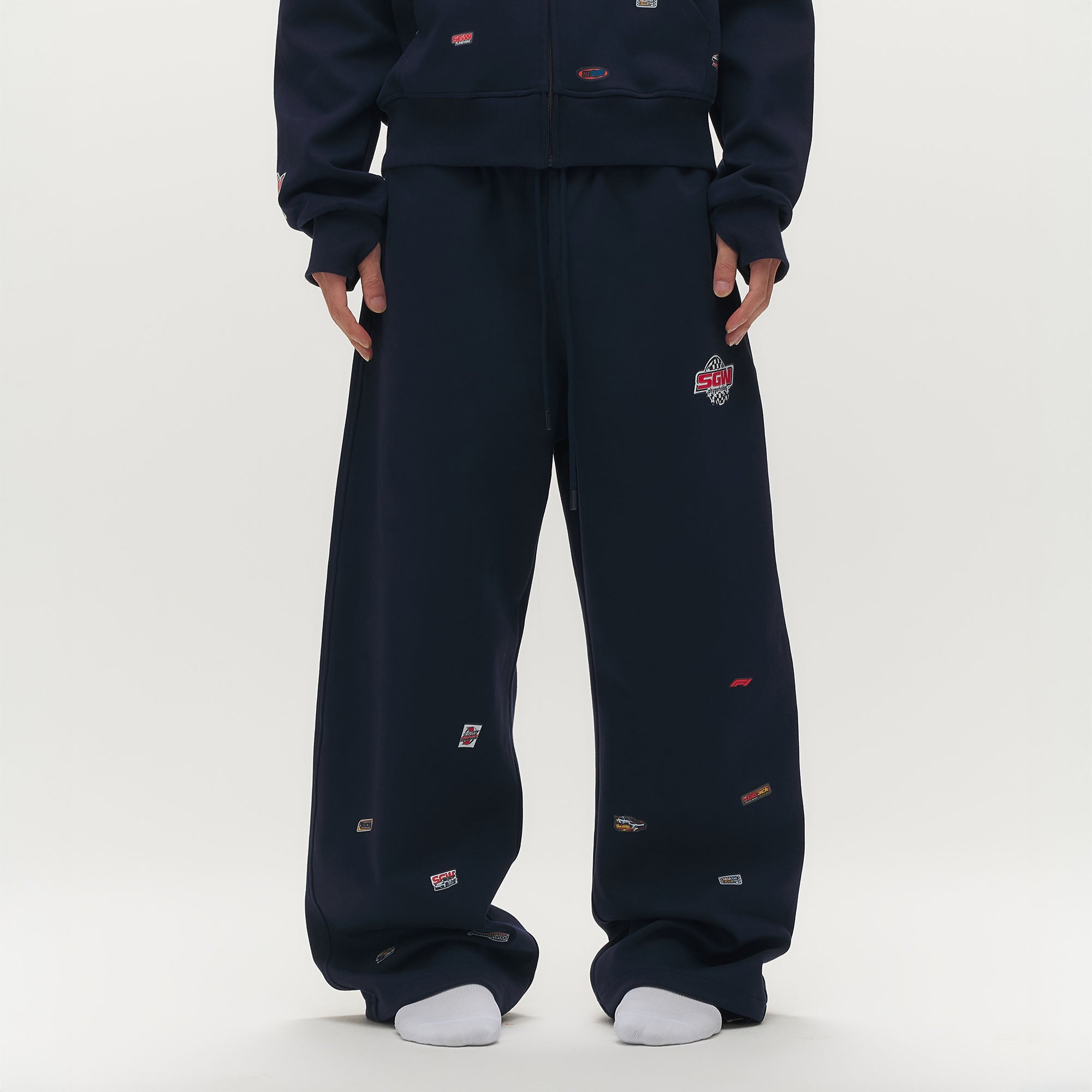 SAVAGEGROWTHWORLD Whimsical Stickers Drawstring Sweatpants