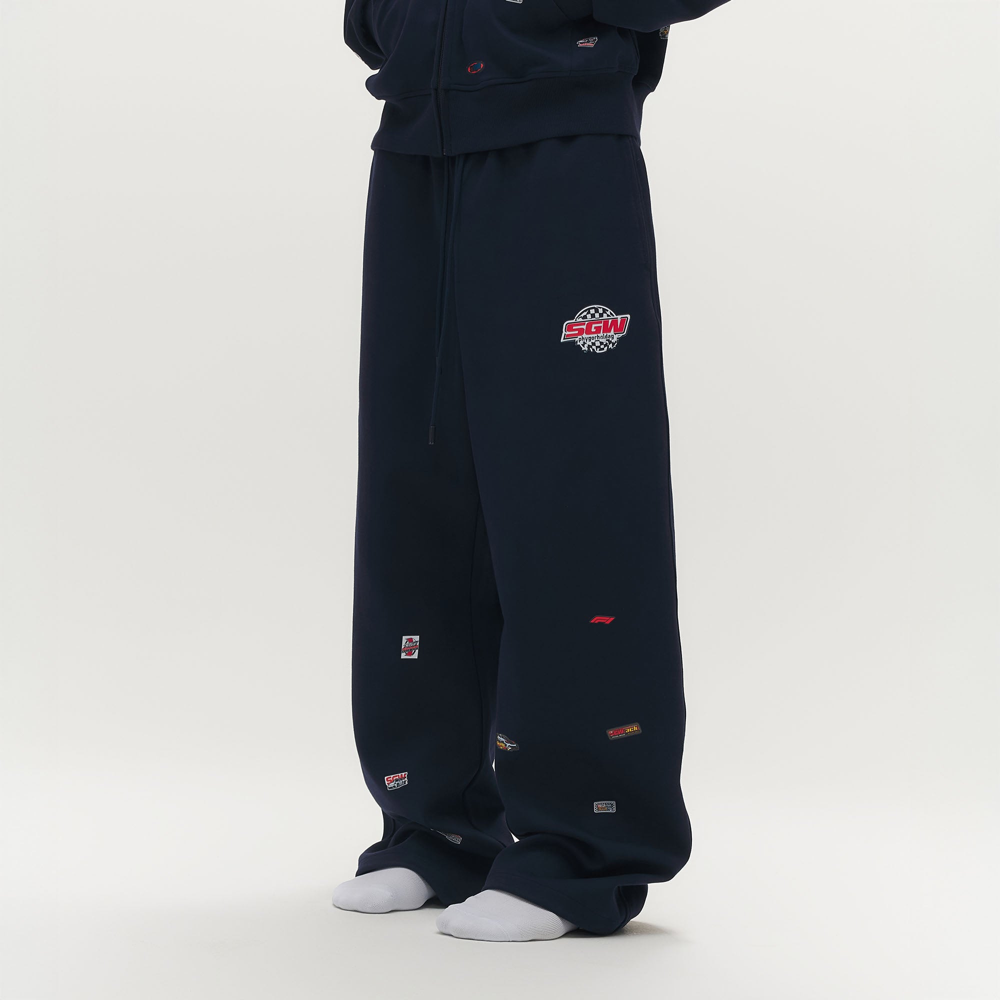 SAVAGEGROWTHWORLD Whimsical Stickers Drawstring Sweatpants