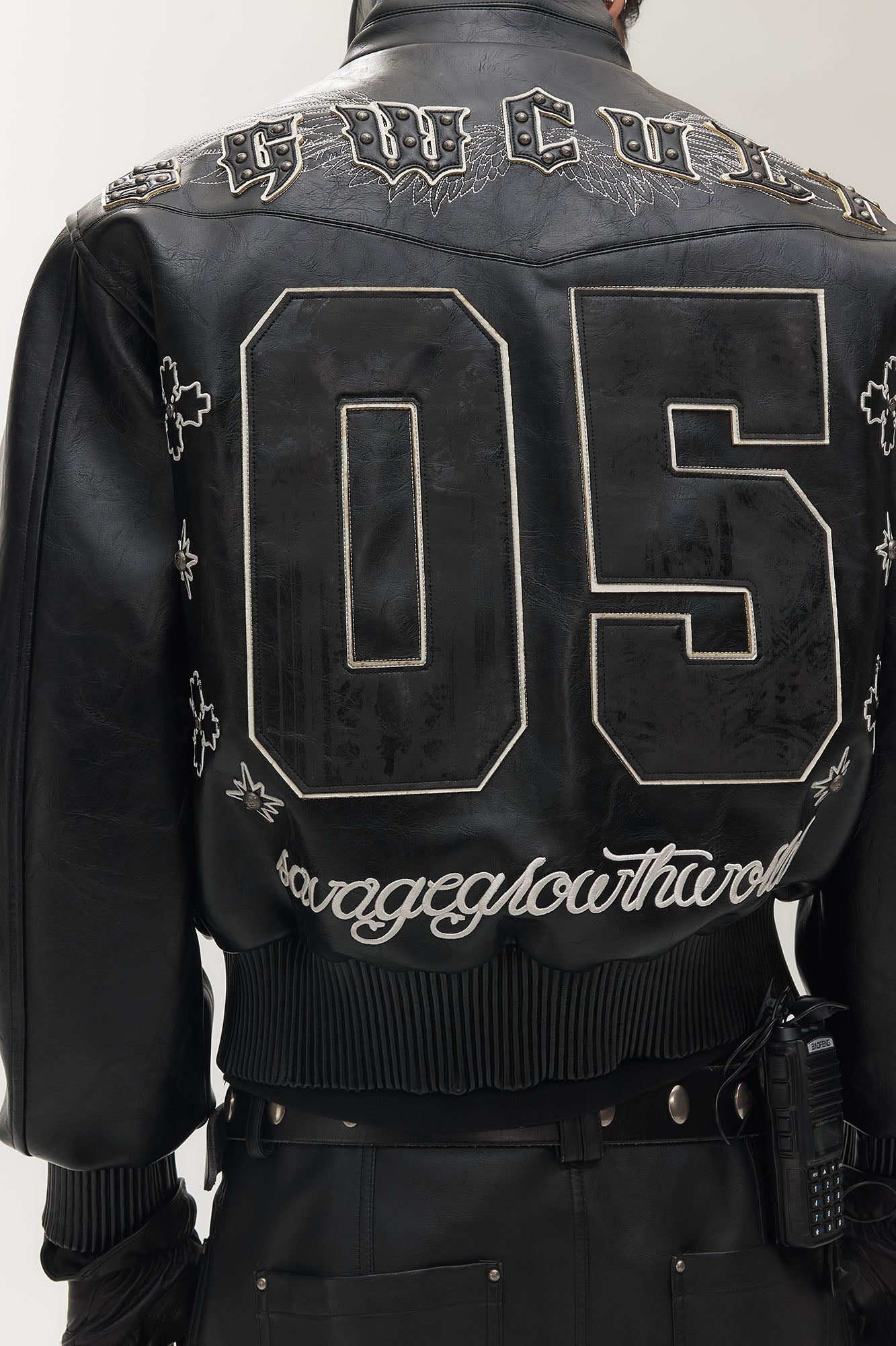 SAVAGEGROWTHWORLD No.05 Patch Faux Leather Studded Moto Jacket