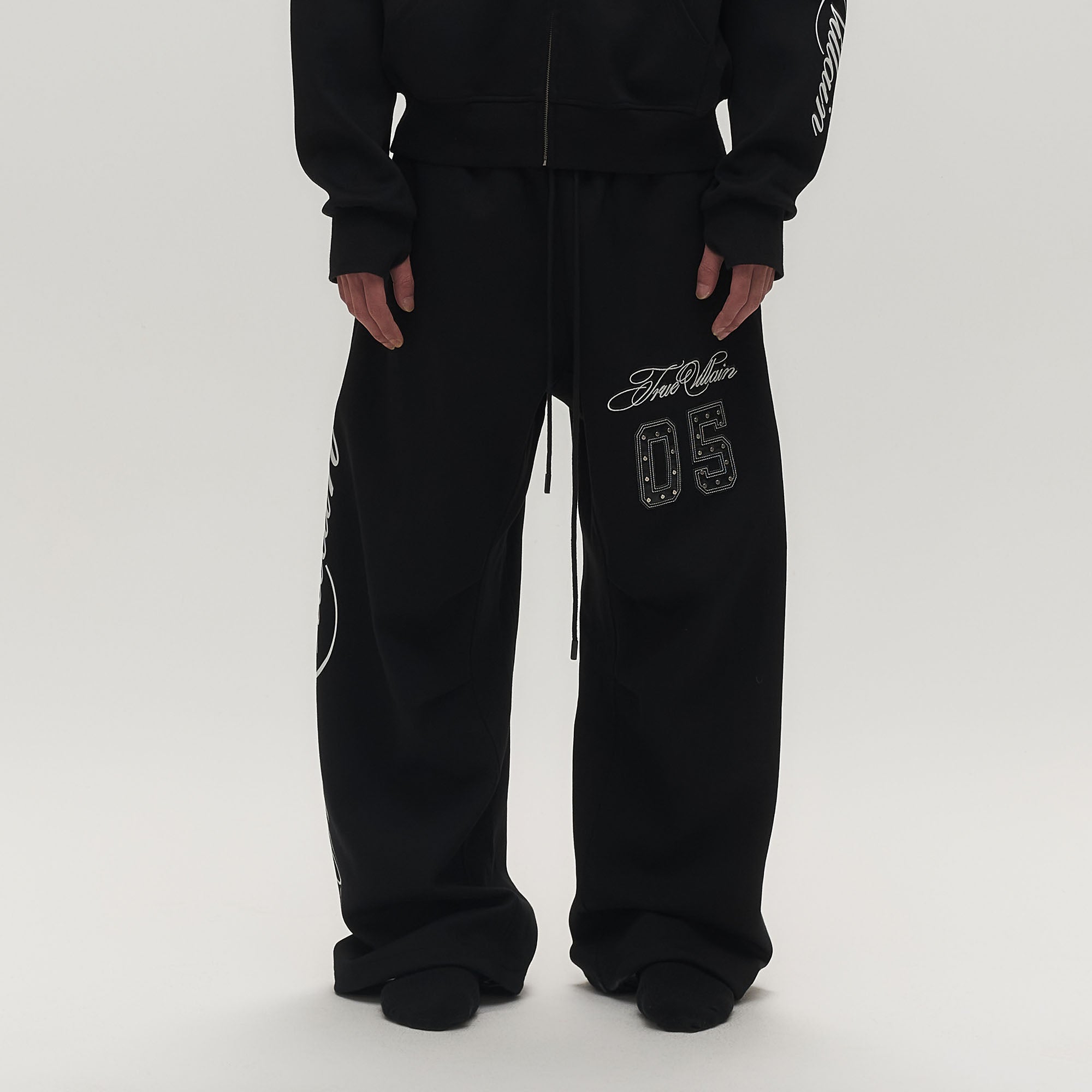 SAVAGEGROWTHWORLD No.05 True Villain Patch Drawstring Sweatpants
