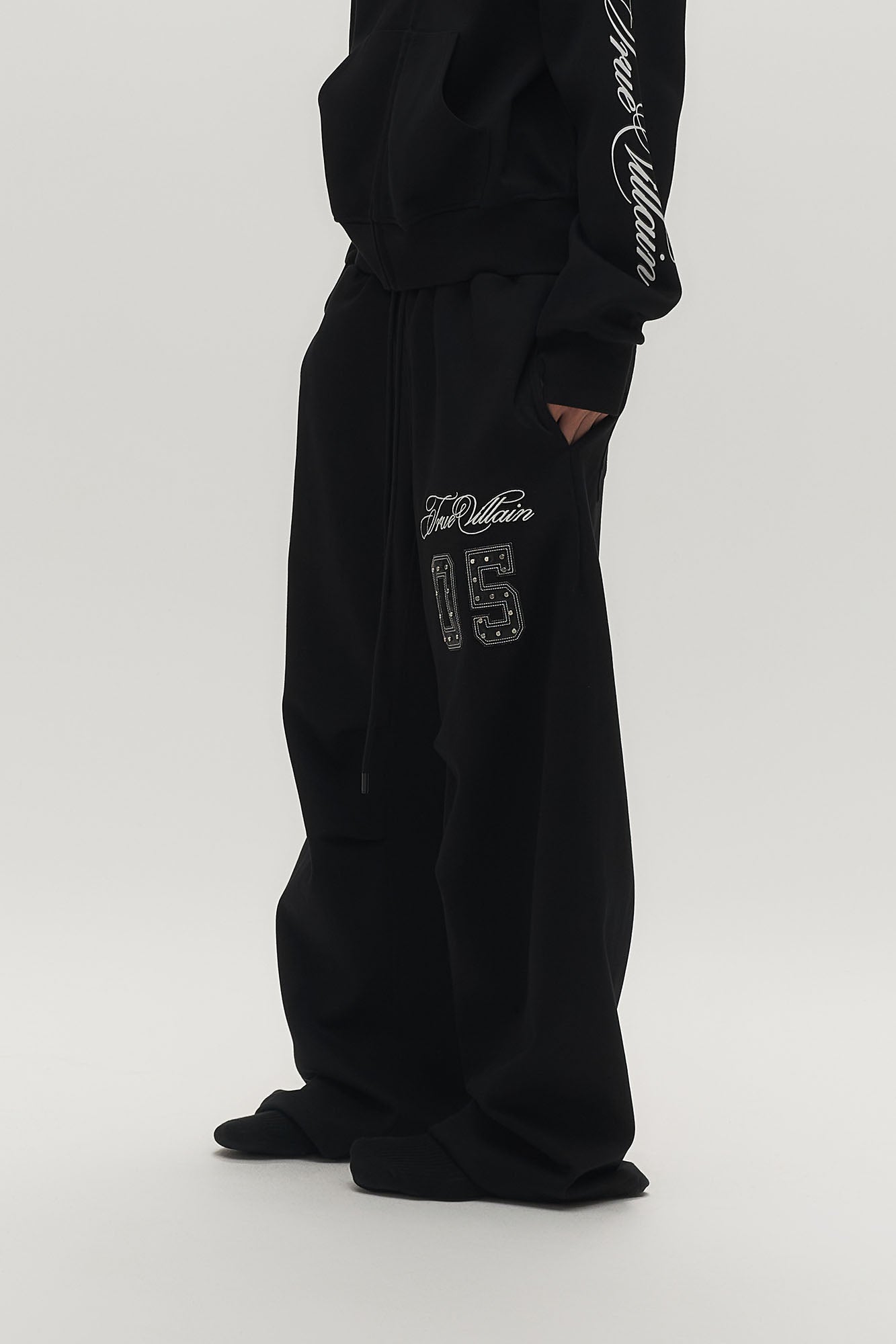 SAVAGEGROWTHWORLD No.05 True Villain Patch Drawstring Sweatpants