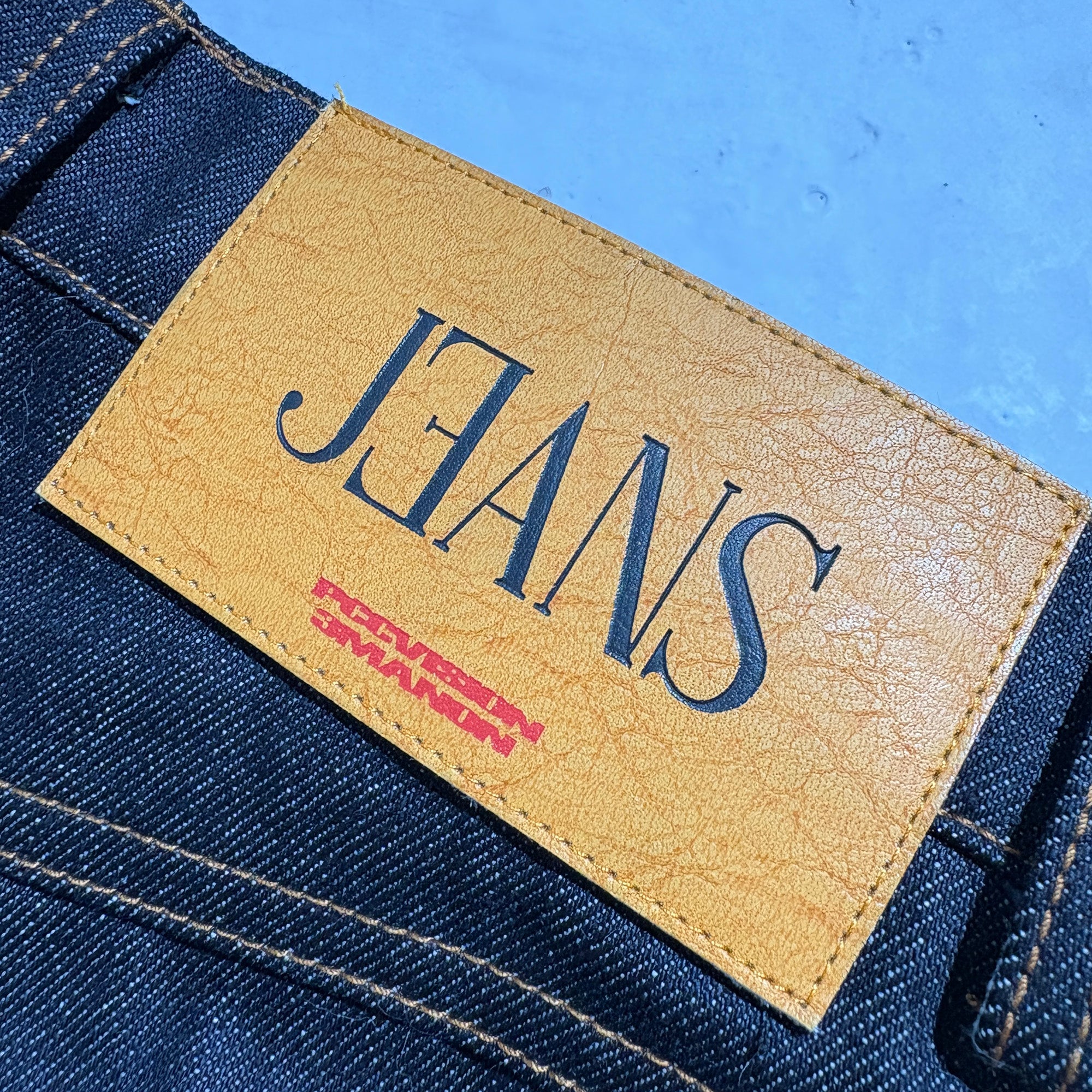 PCCVISION Baroque Embroidered Raw Denim Stacked Jeans