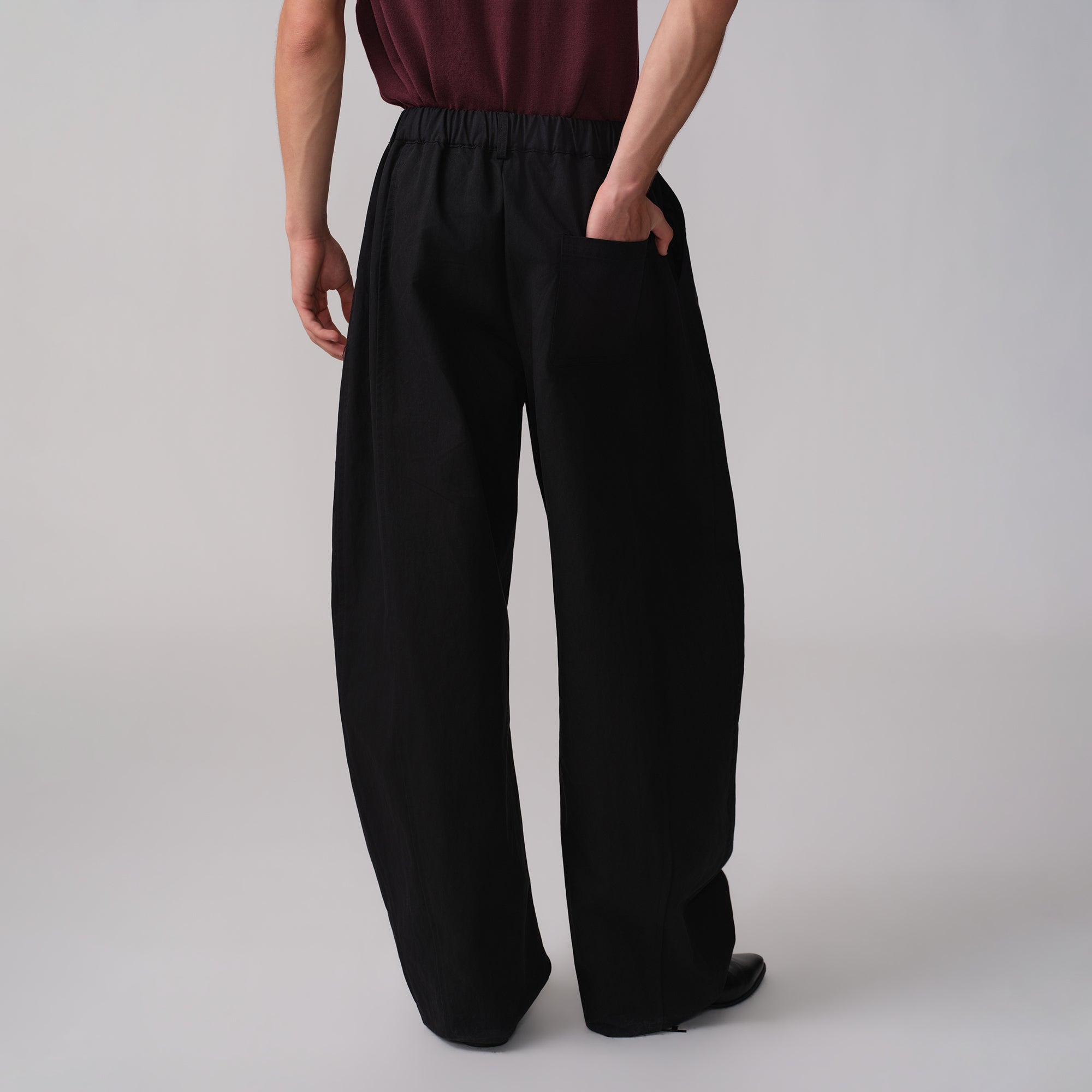 OPICLOTH Pleated Curved Wide-Leg Trousers