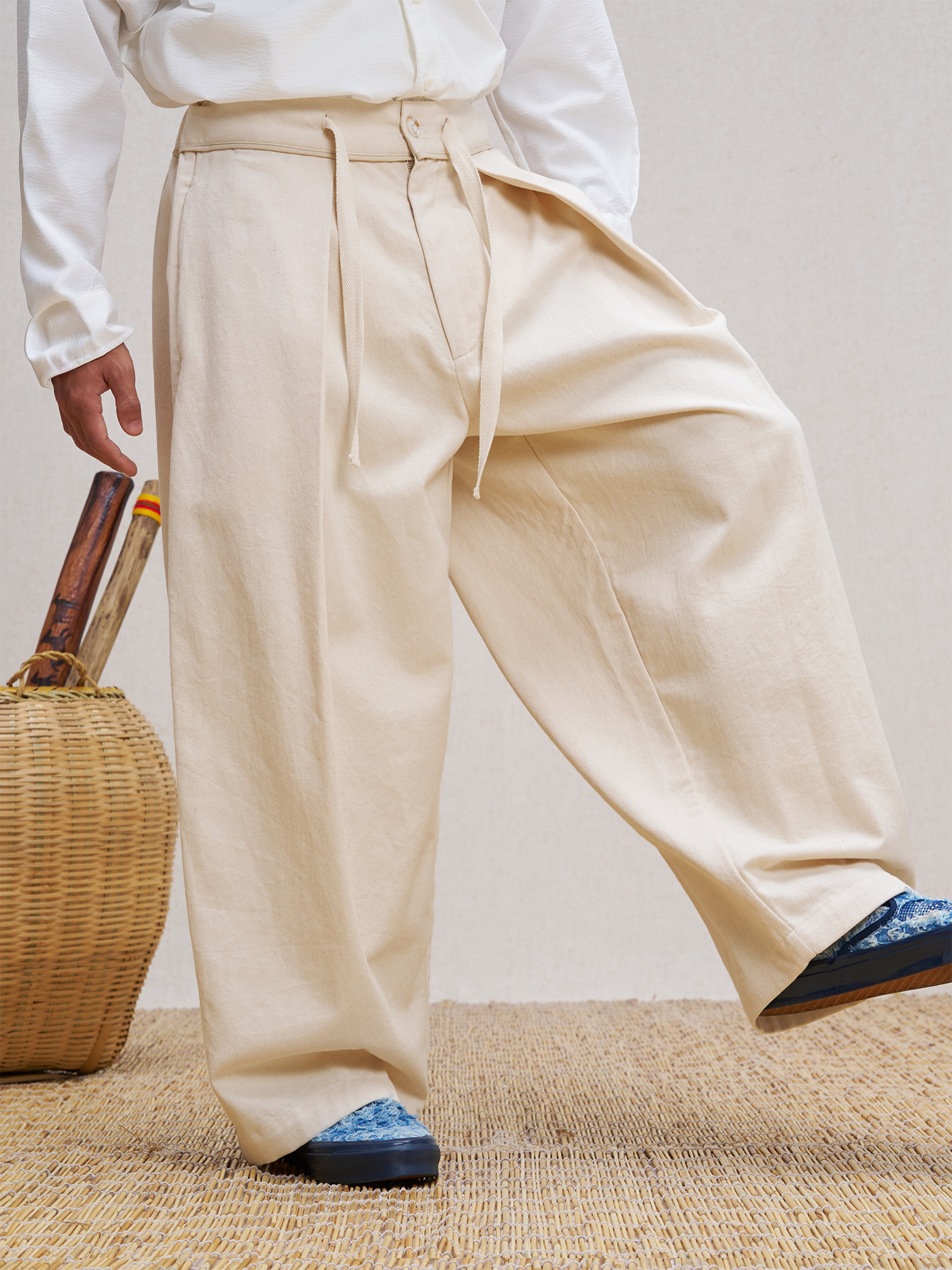 UNLIMITED MOTE Pleated Herringbone Wide-Leg Trousers