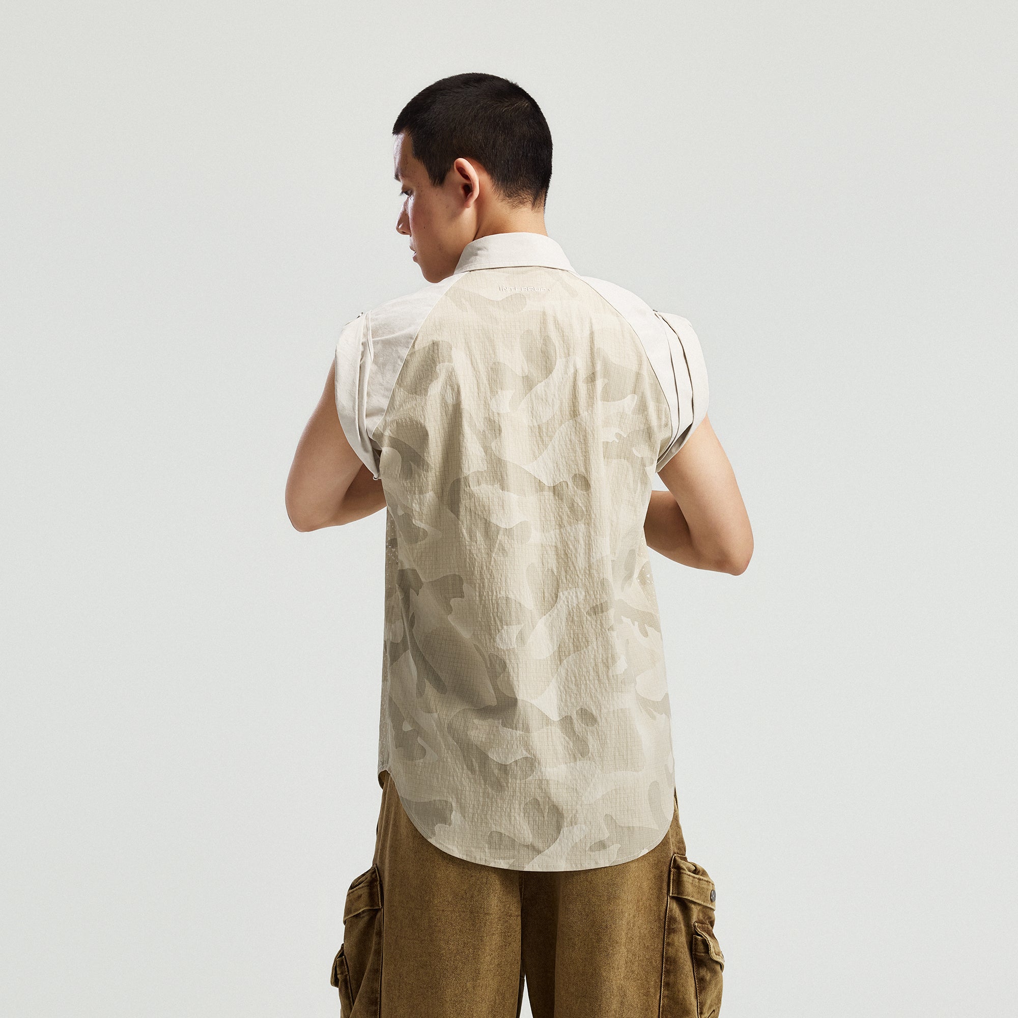 INTERRUPT Camo Graphic Sleeveless Studded Raglan Shirt