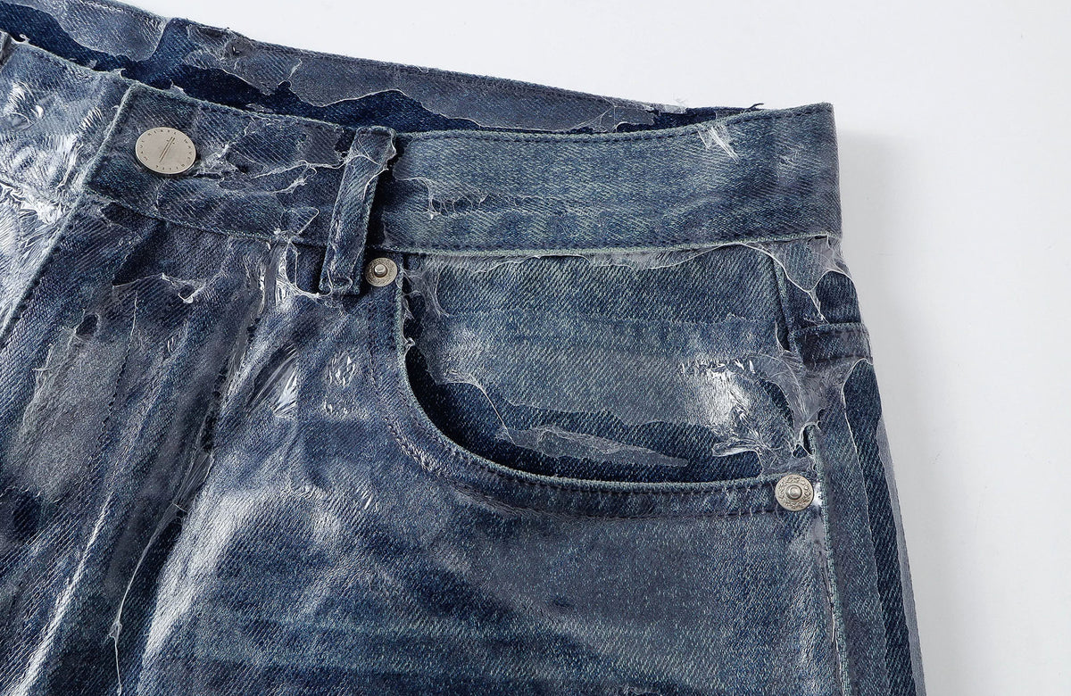 REBEL WAVE Frayed Raw-Edge Wax-Coated Flared Jeans