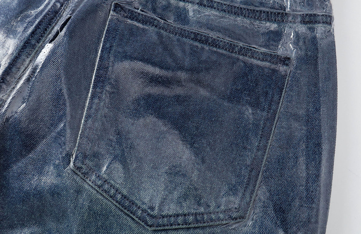 REBEL WAVE Frayed Raw-Edge Wax-Coated Flared Jeans
