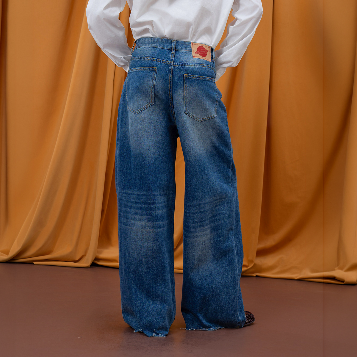 CLP Washed Distressed Raw-Edge Wide-Leg Jeans