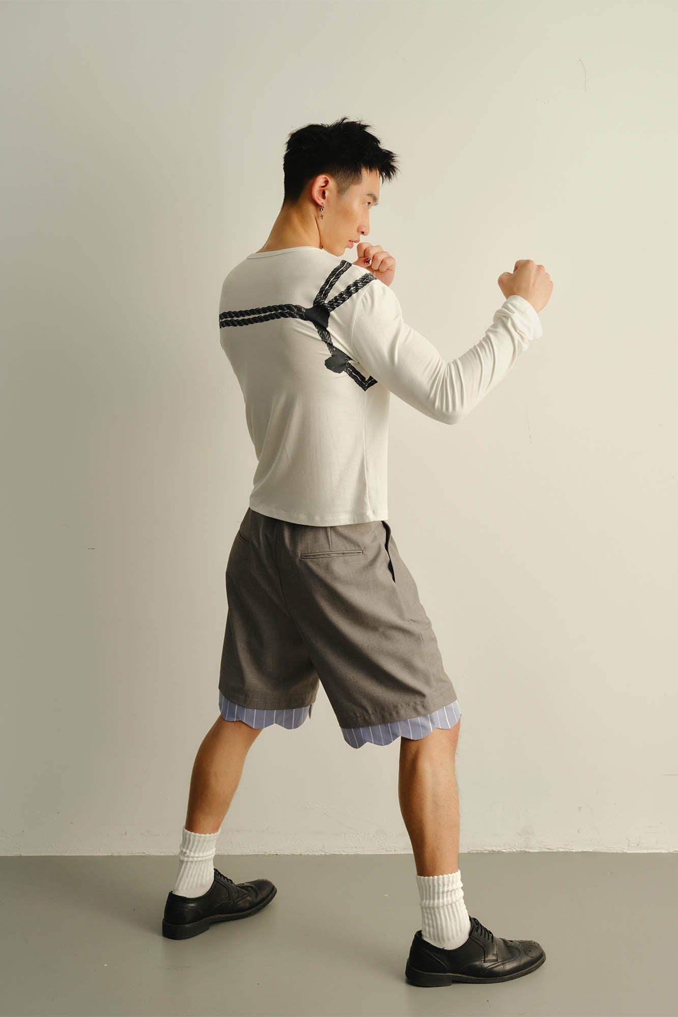 KADAKADA Scalloped Layered Hem Pleated Shorts