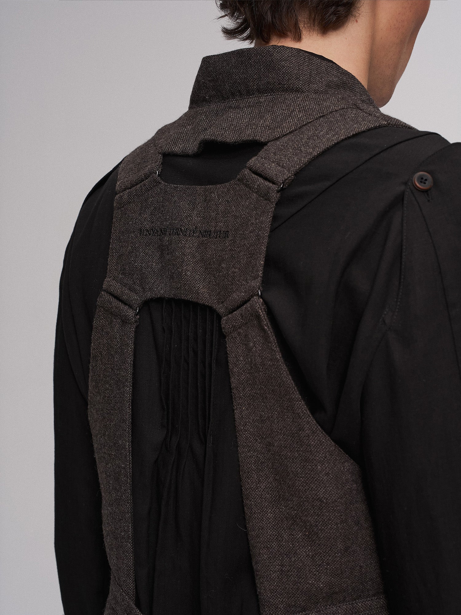 ILNya Nieternite Nifutur Retro Button Embellished Back-Harness Vest, premium urban and streetwear designers apparel on PROJECTISR.com, ILNya Nieternite Nifutur