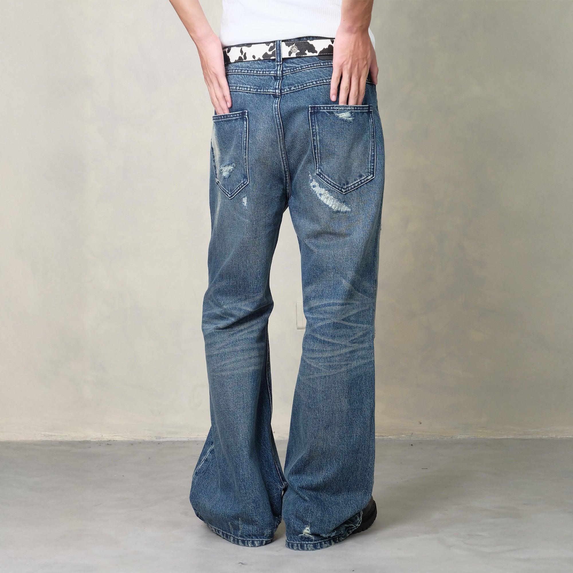 IN EXISTENCE Distressed Stitched Patch Flared Jeans