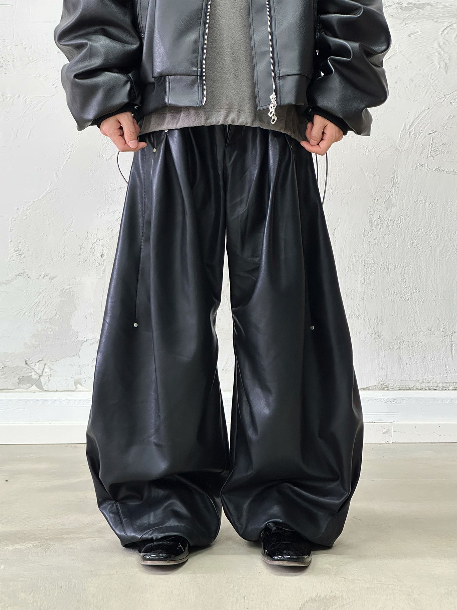 RELABEL Pleated Rivet Oversized PU Pants, premium urban and streetwear designers apparel on PROJECTISR.com, RELABEL