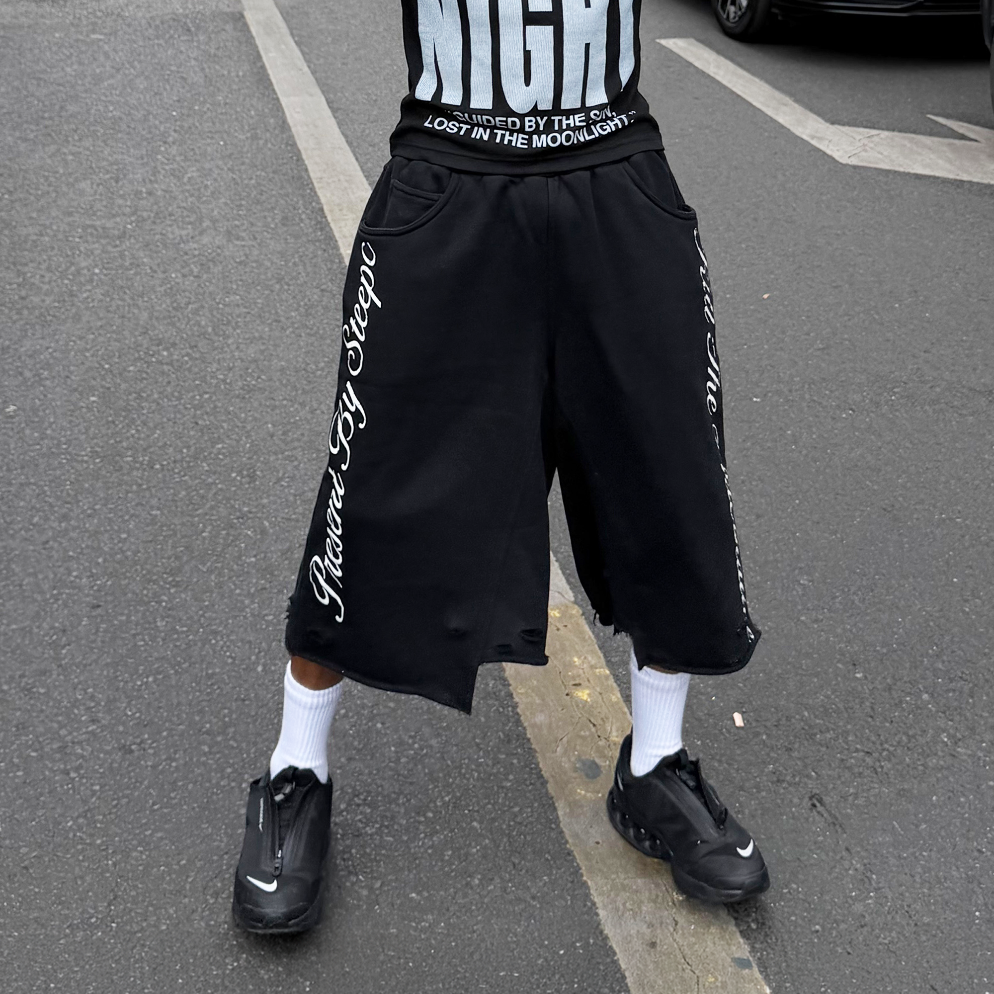 STEEPC Raw Edge Graphic Paneled Sweat Shorts