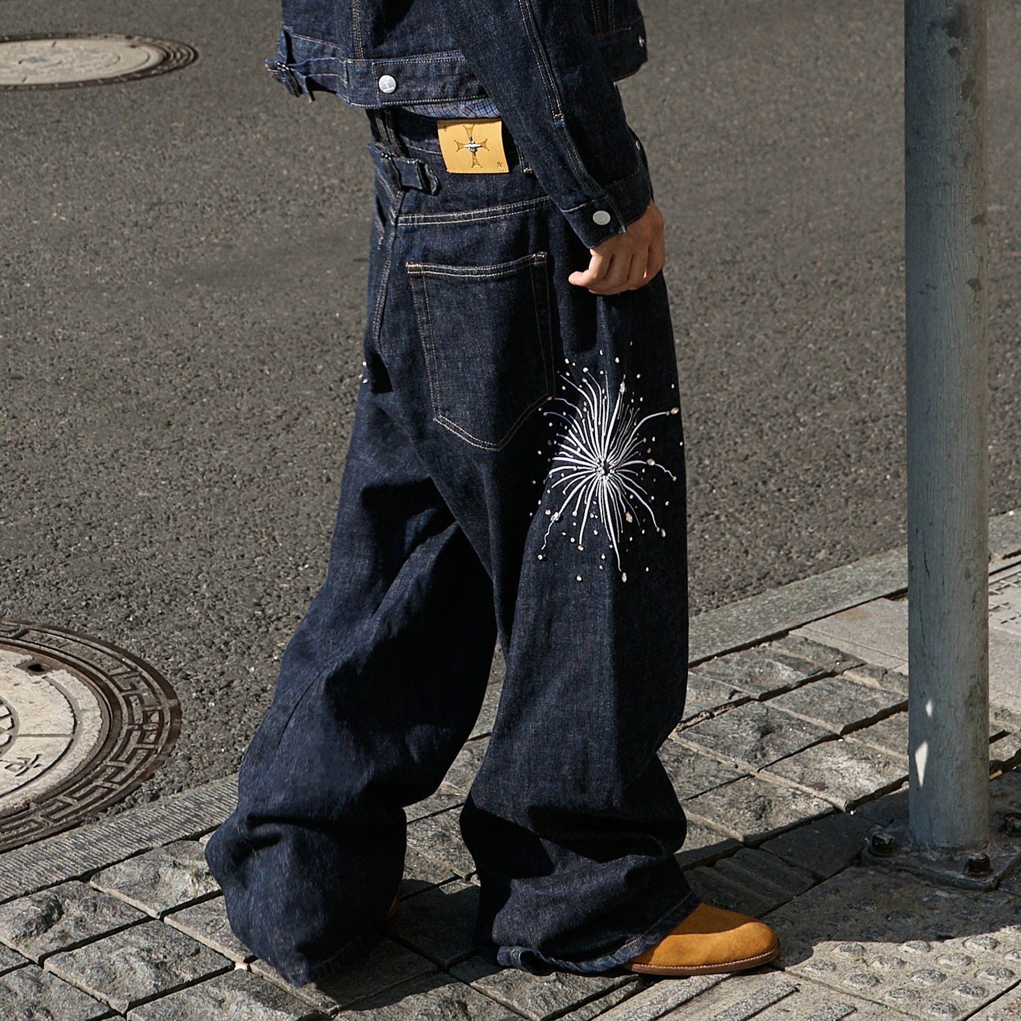 STEEPC Firework Embroidered Rhinestone Curved Raw Jeans