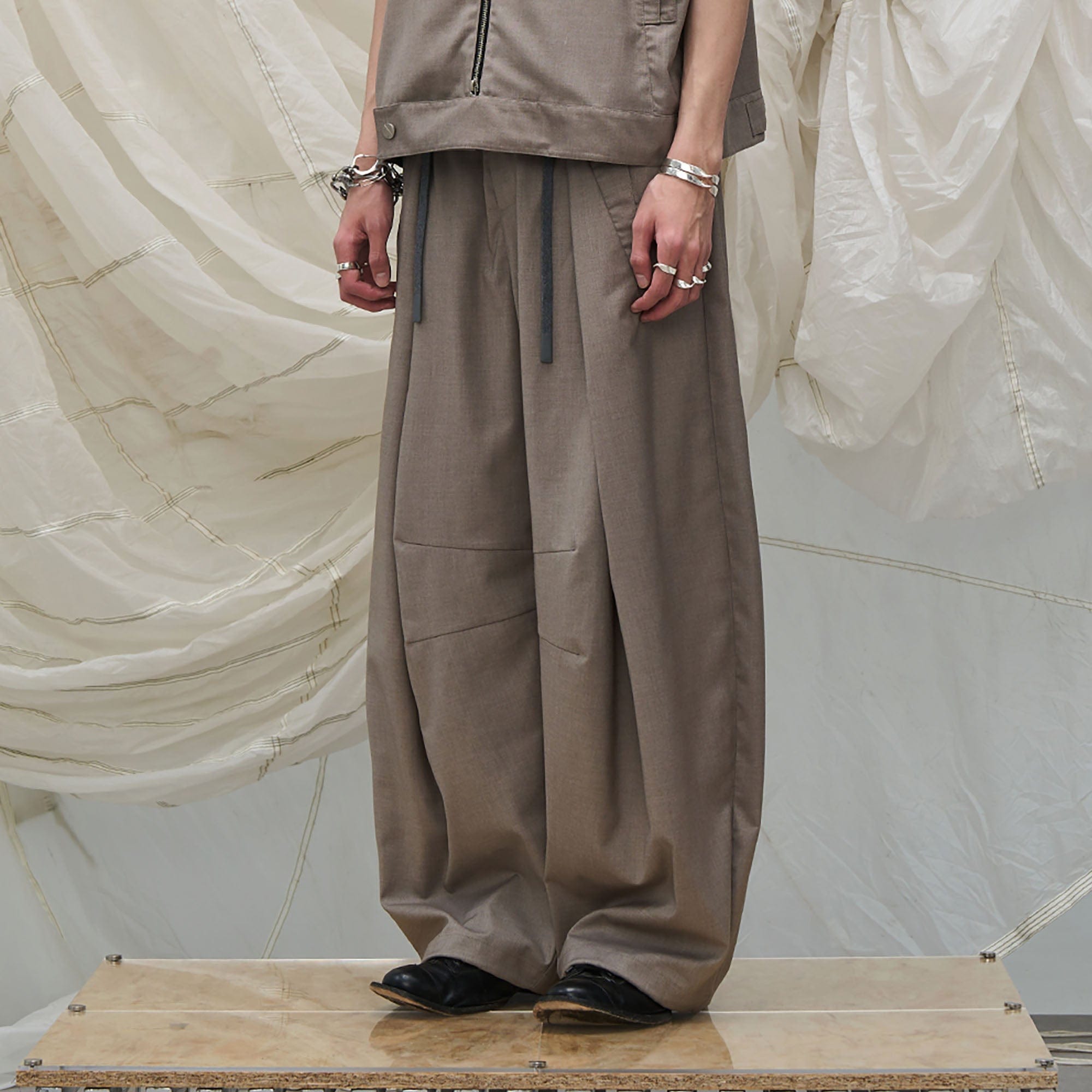 RELABEL Pleated Drawstring Curved Wide-Leg Trousers, premium urban and streetwear designers apparel on PROJECTISR.com, RELABEL