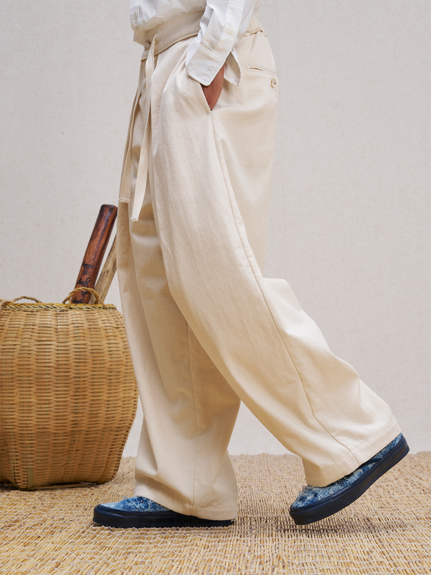 UNLIMITED MOTE Pleated Herringbone Wide-Leg Trousers