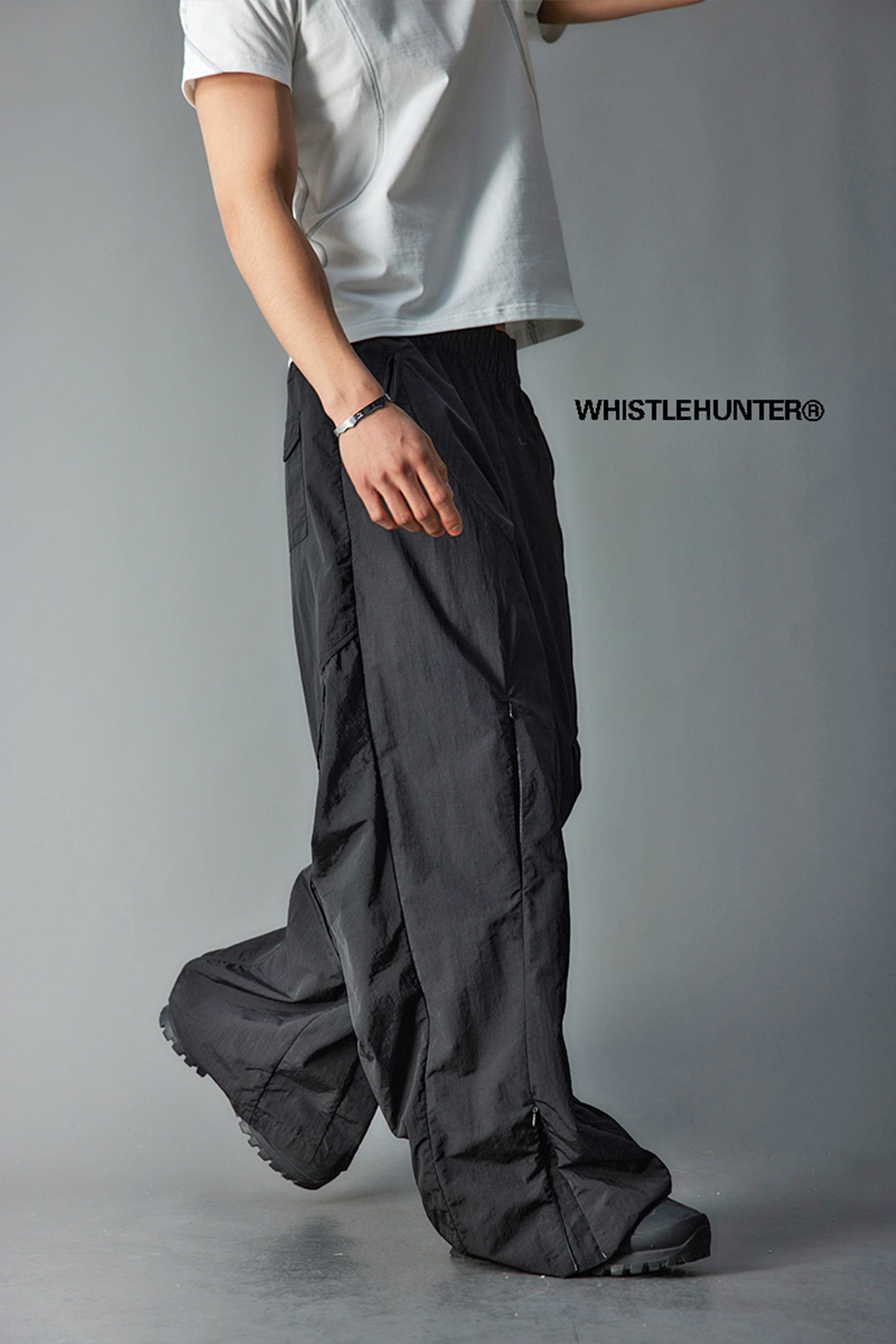 WHISTLEHUNTER Deconstructed Pleated Zipper Pockets Pants