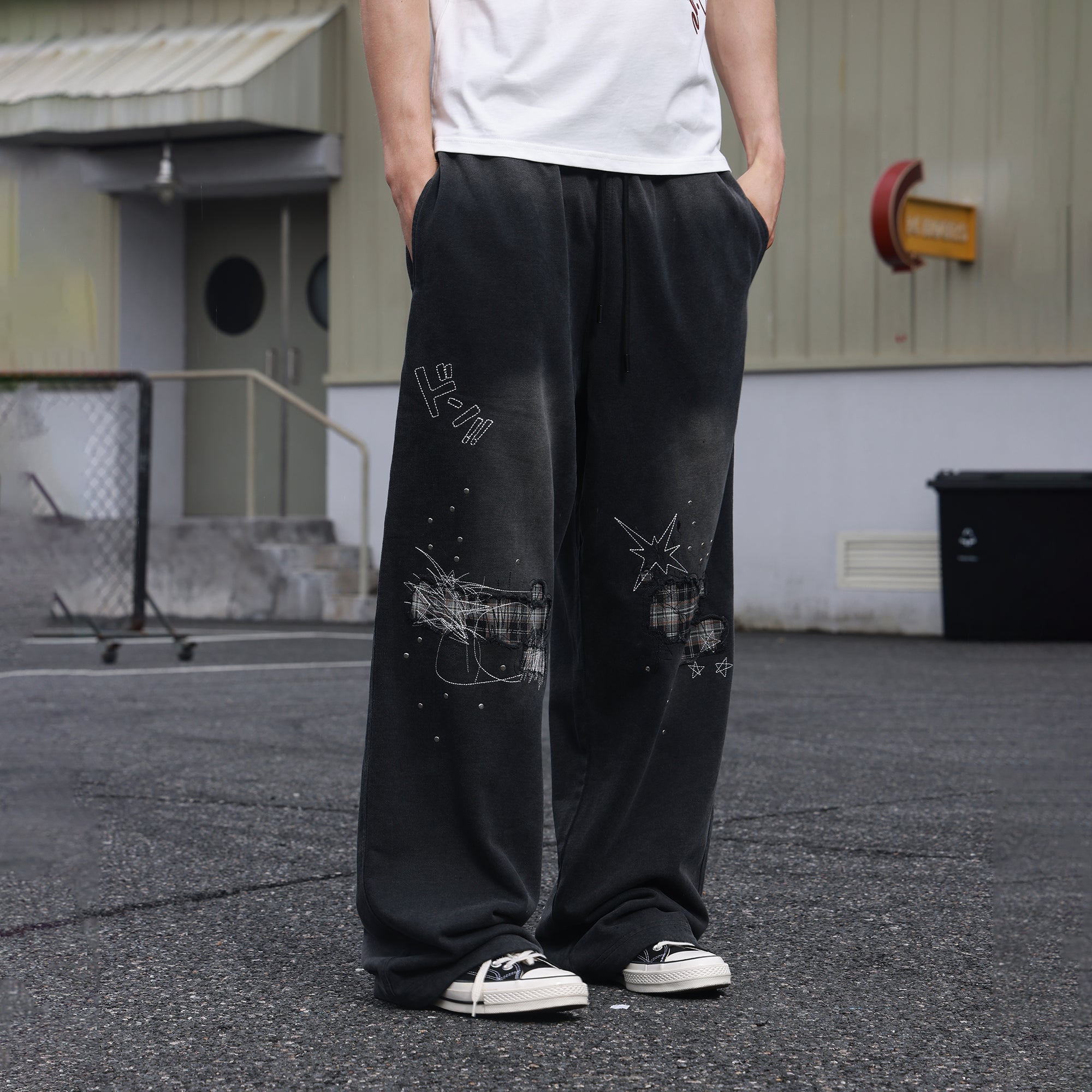 SAVAGEGROWTHWORLD Studded Plaid Panel Sweatpants