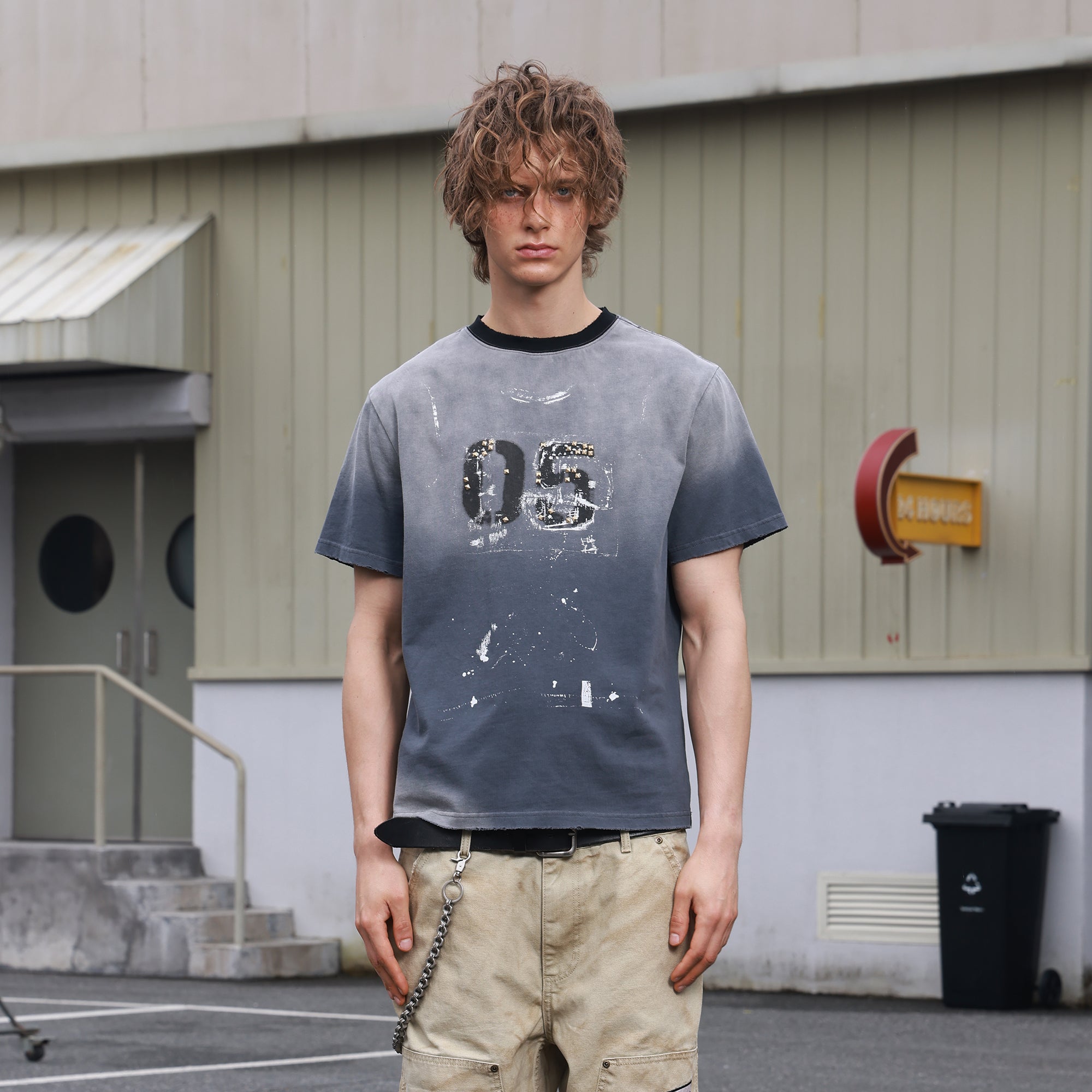 SAVAGEGROWTHWORLD Studded Distressed Graphic T-Shirt