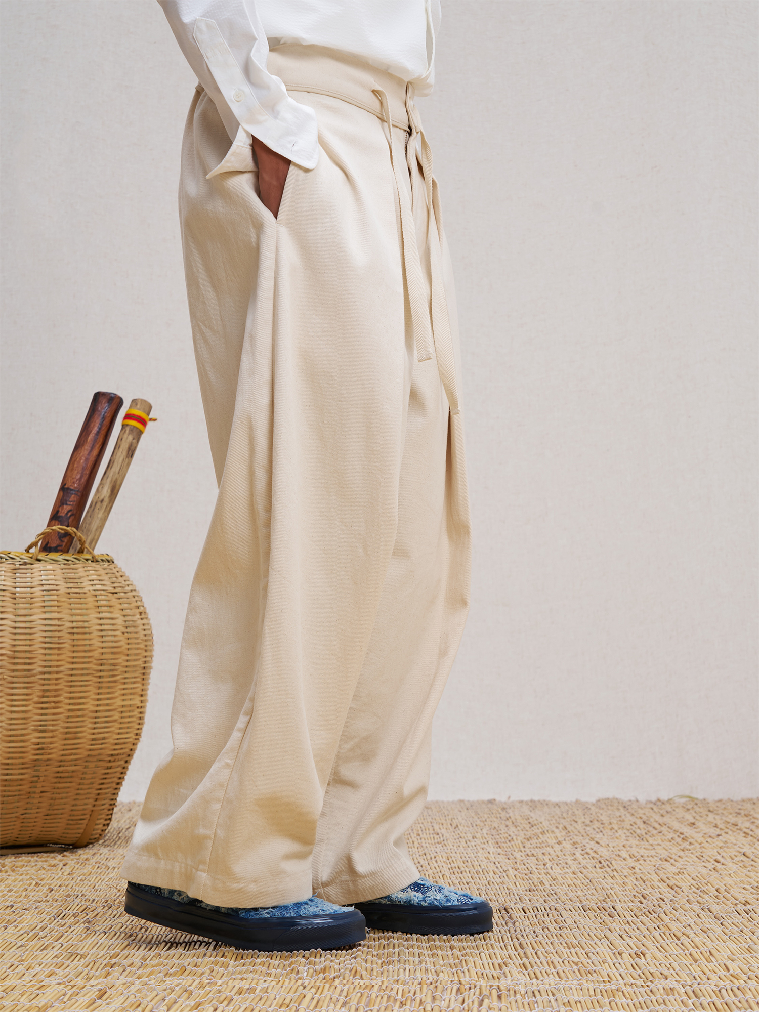 UNLIMITED MOTE Pleated Herringbone Wide-Leg Trousers