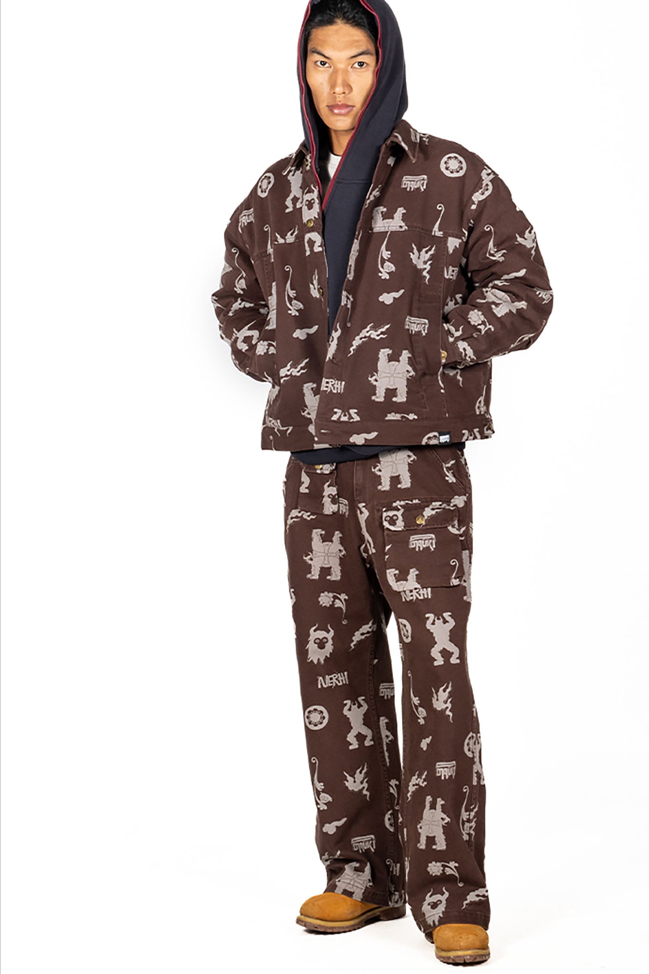 NERHI Tribal Totem Full-Print Patch-Pocket Pants