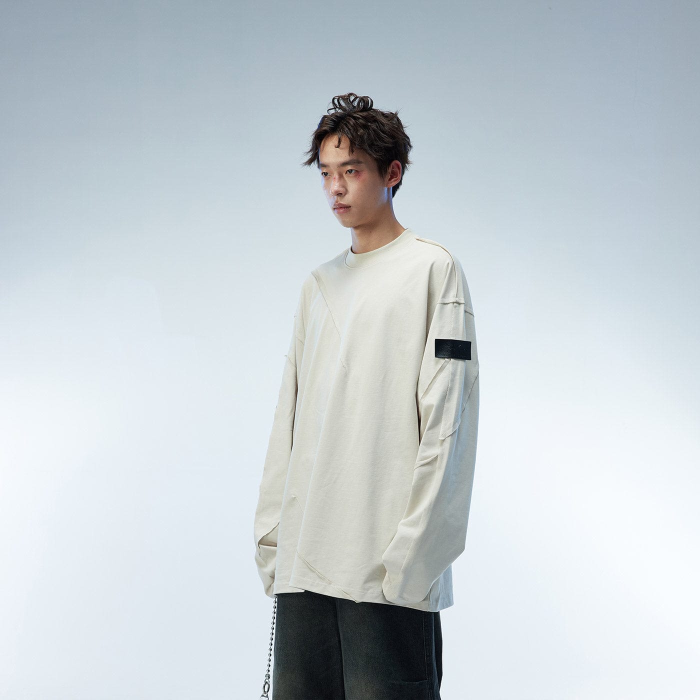 WHISTLEHUNTER Asymmetric Cut Logo Patched L/S Tee, premium urban and streetwear designers apparel on PROJECTISR.com, WHISTLEHUNTER