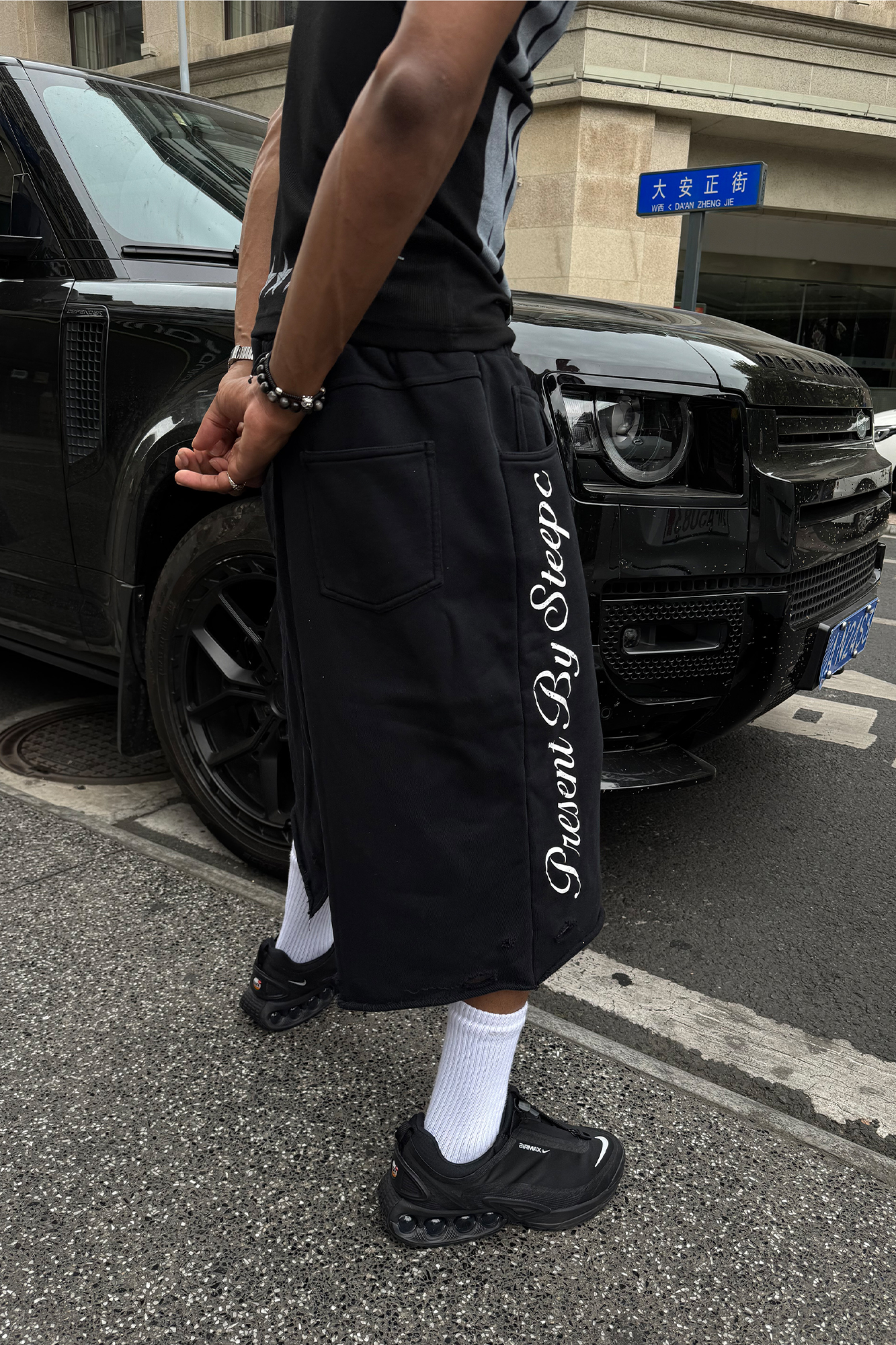 STEEPC Raw Edge Graphic Paneled Sweat Shorts