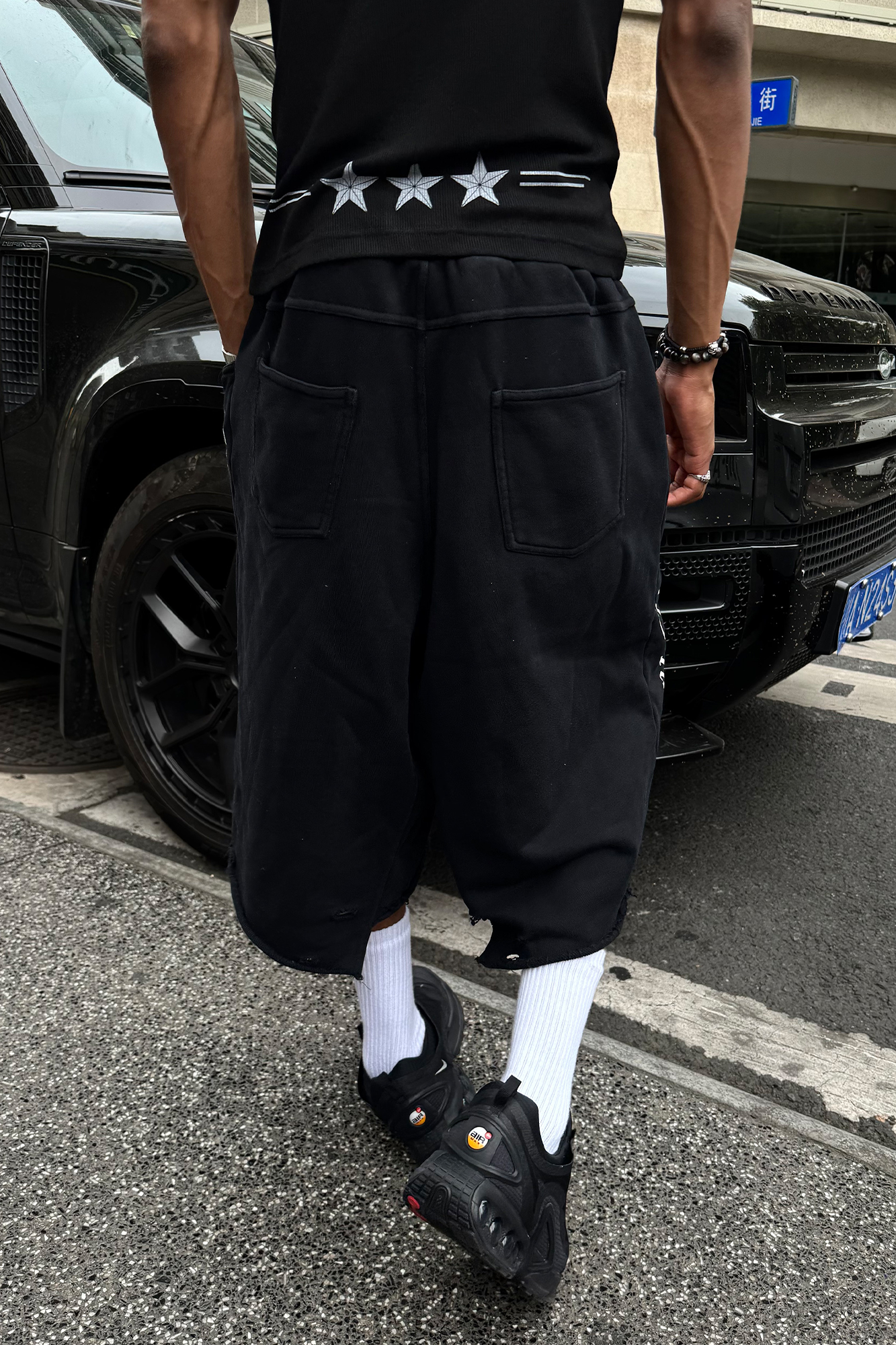 STEEPC Raw Edge Graphic Paneled Sweat Shorts
