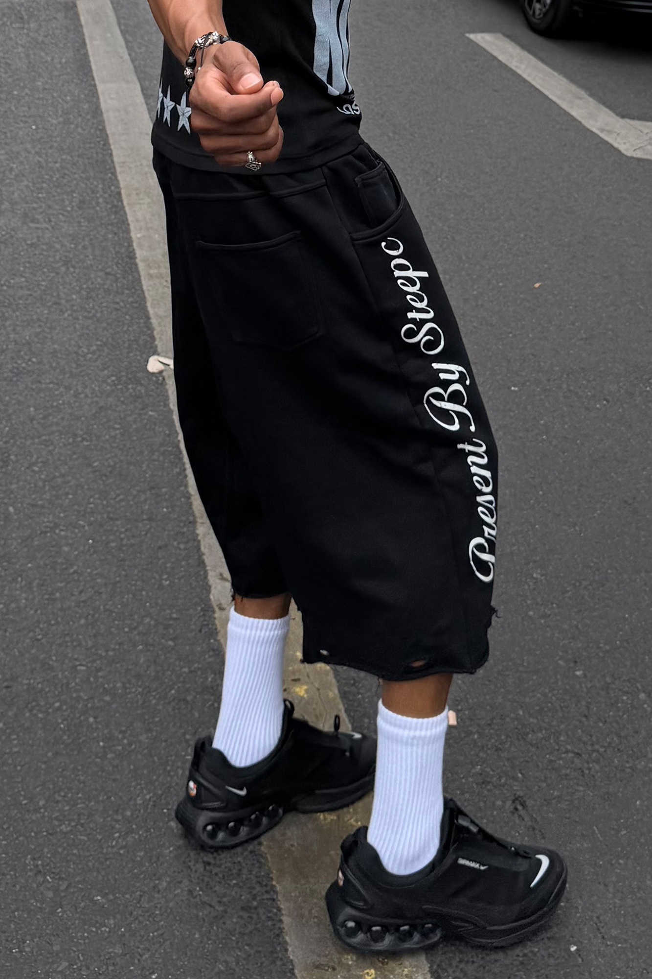 STEEPC Raw Edge Graphic Paneled Sweat Shorts