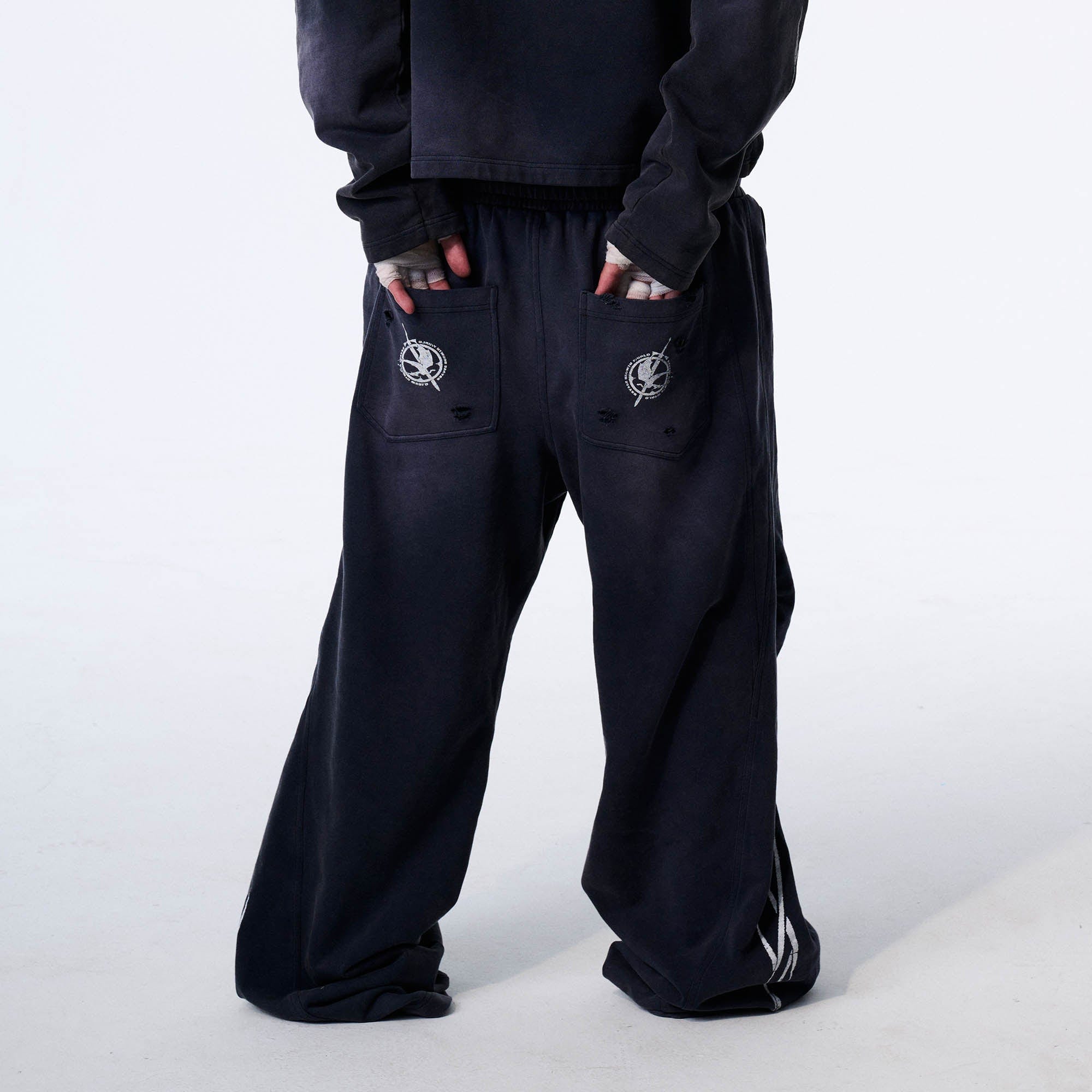 SAVAGEGROWTHWORLD Distressed Pleated Drawstring Baggy Pants