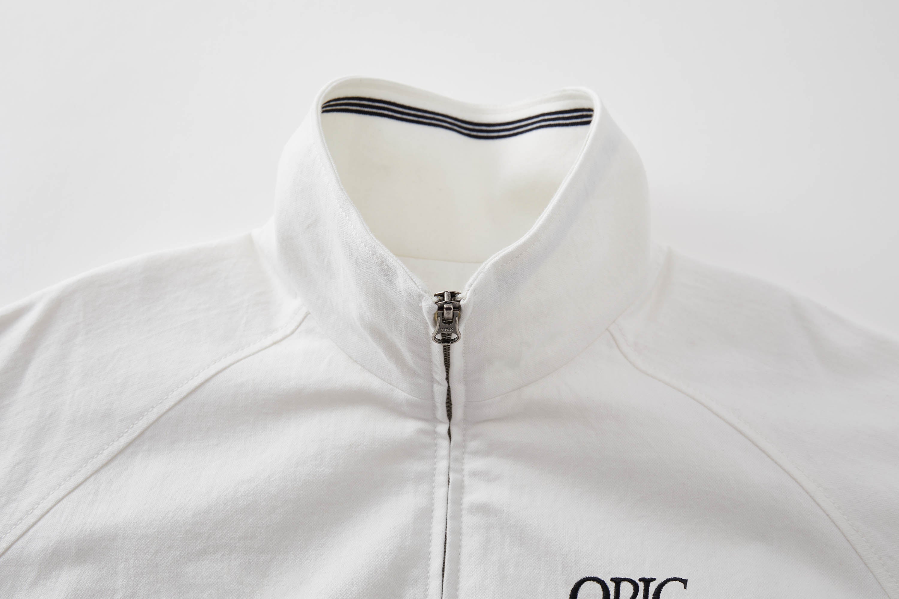 OPICLOTH Embroidered Logo Stand Collar Raglan Jacket