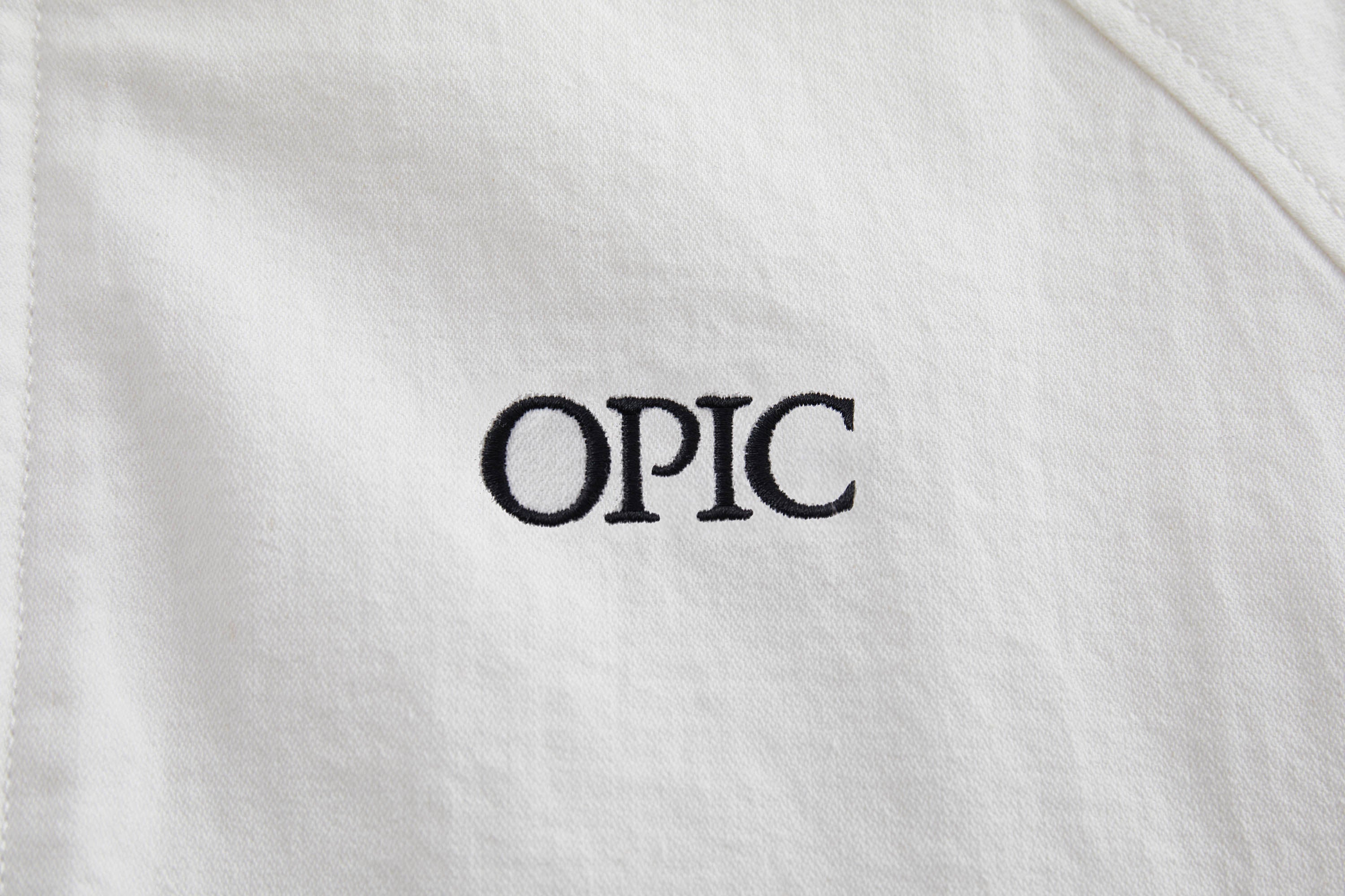 OPICLOTH Embroidered Logo Stand Collar Raglan Jacket