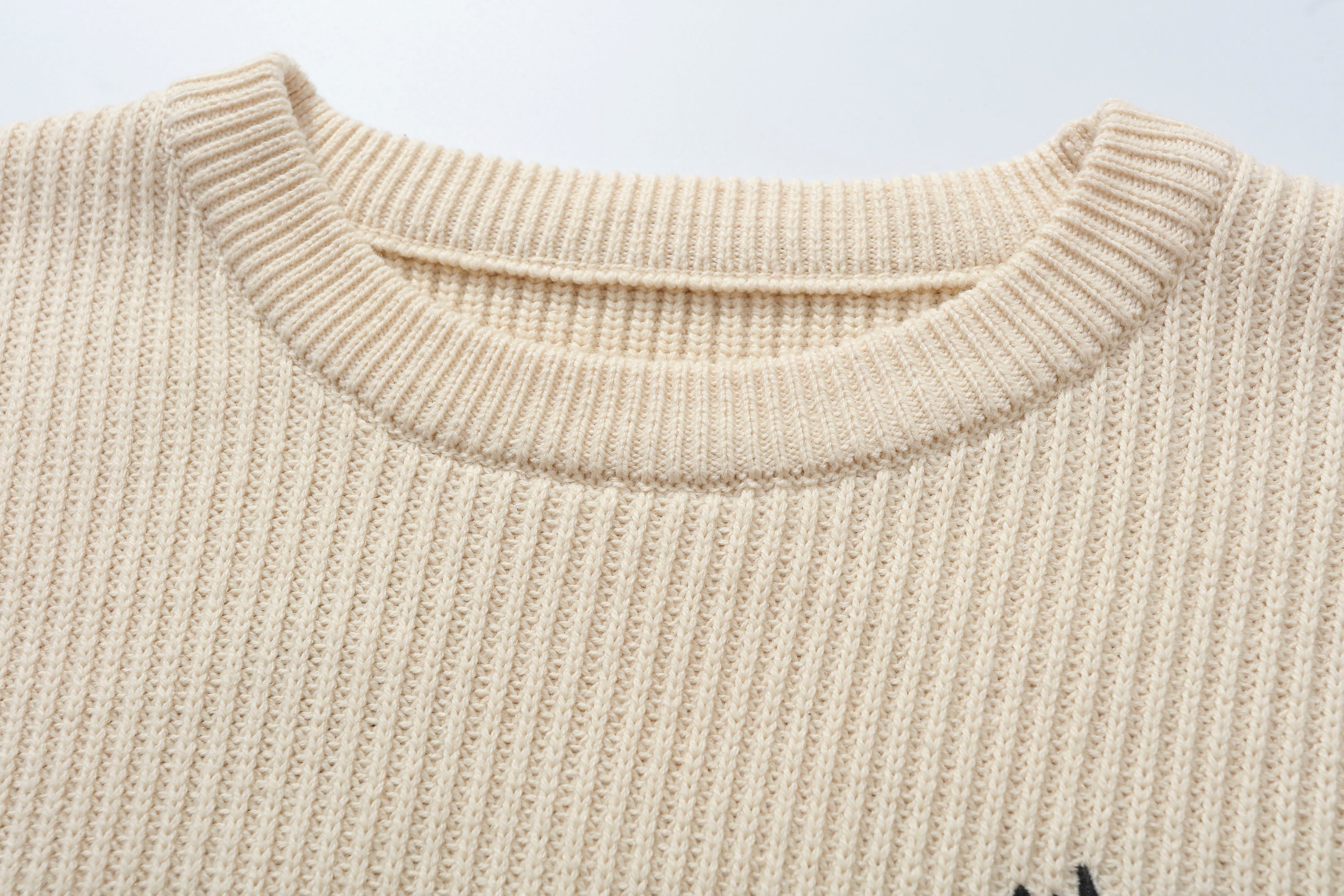 MAKEMORE Embossed Logo Rib Sweater