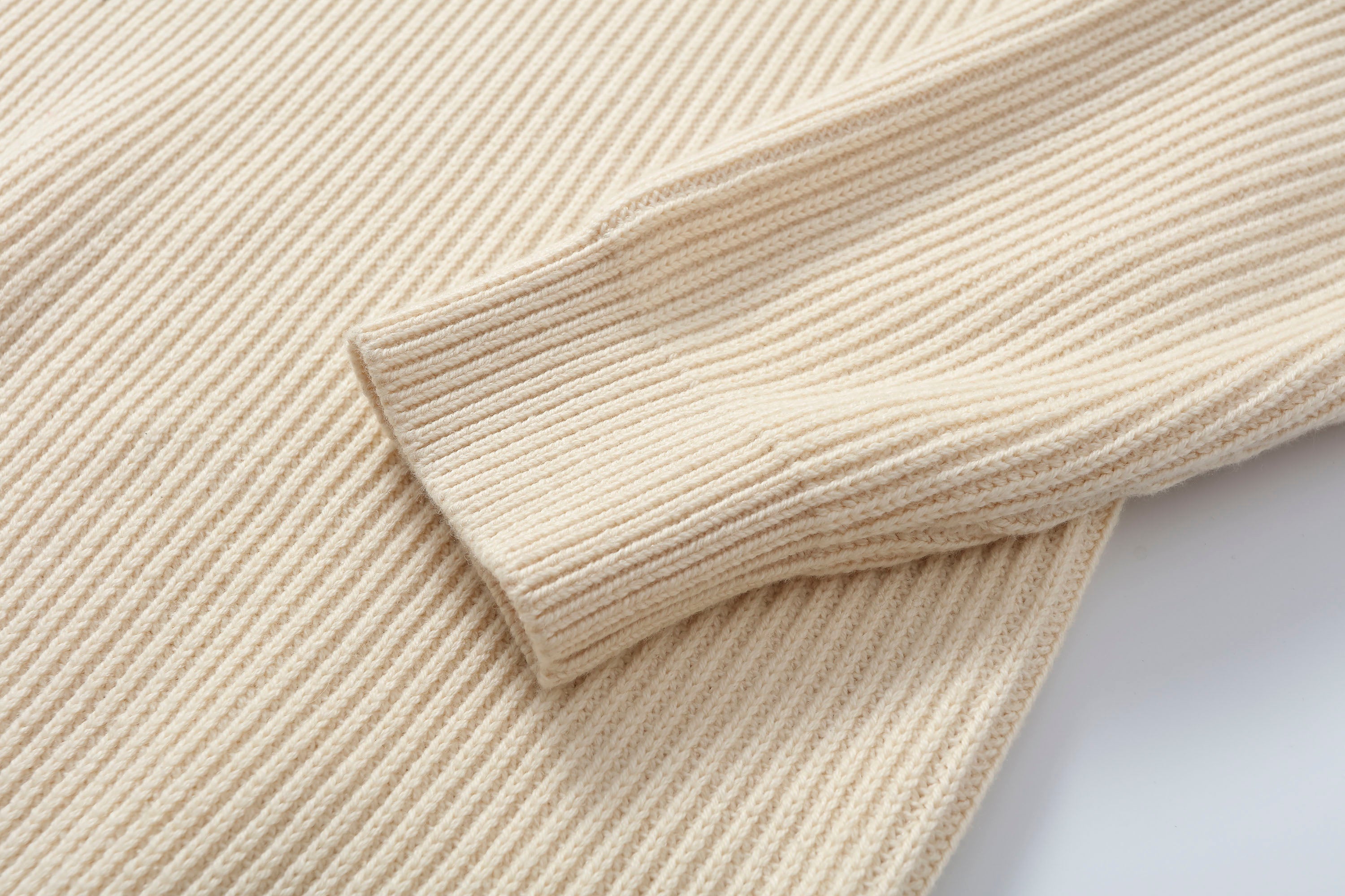 MAKEMORE Embossed Logo Rib Sweater