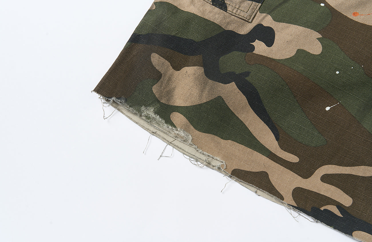 SAVAGEGROWTHWORLD Distressed Paint-Splatter Camo Shorts
