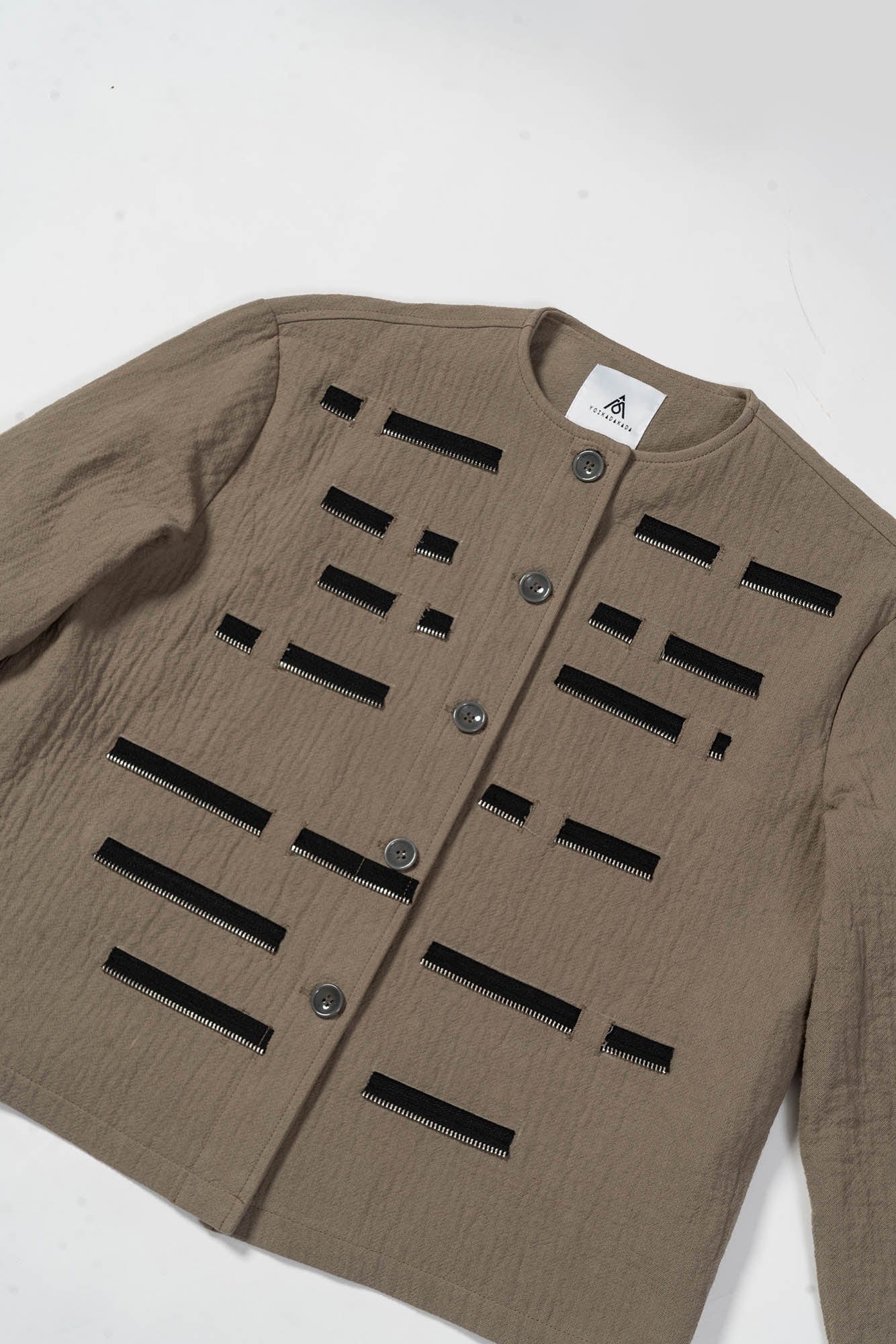 KADAKADA Segmented Zipper Paneled Round Collar Jacket